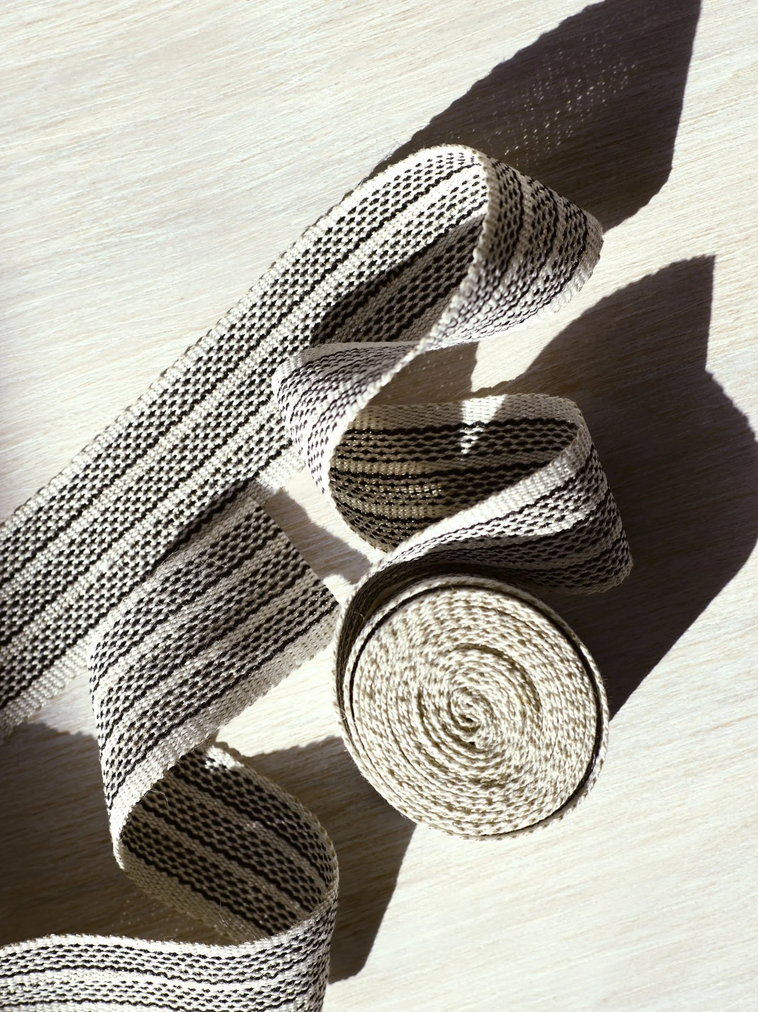 Agnes handwoven linen tape trim in crisp black and white in medium width.