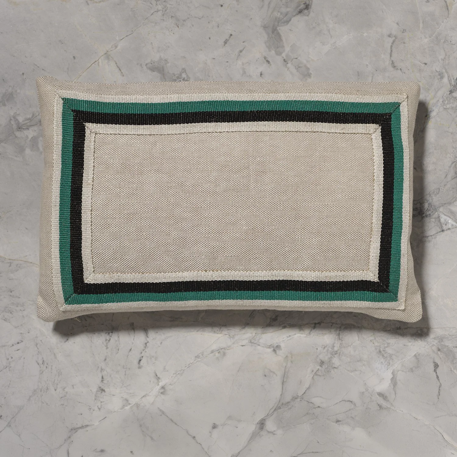 12x18 linen pillow with 1-7/8" Dorothy handwoven tape trim in black, emerald and white