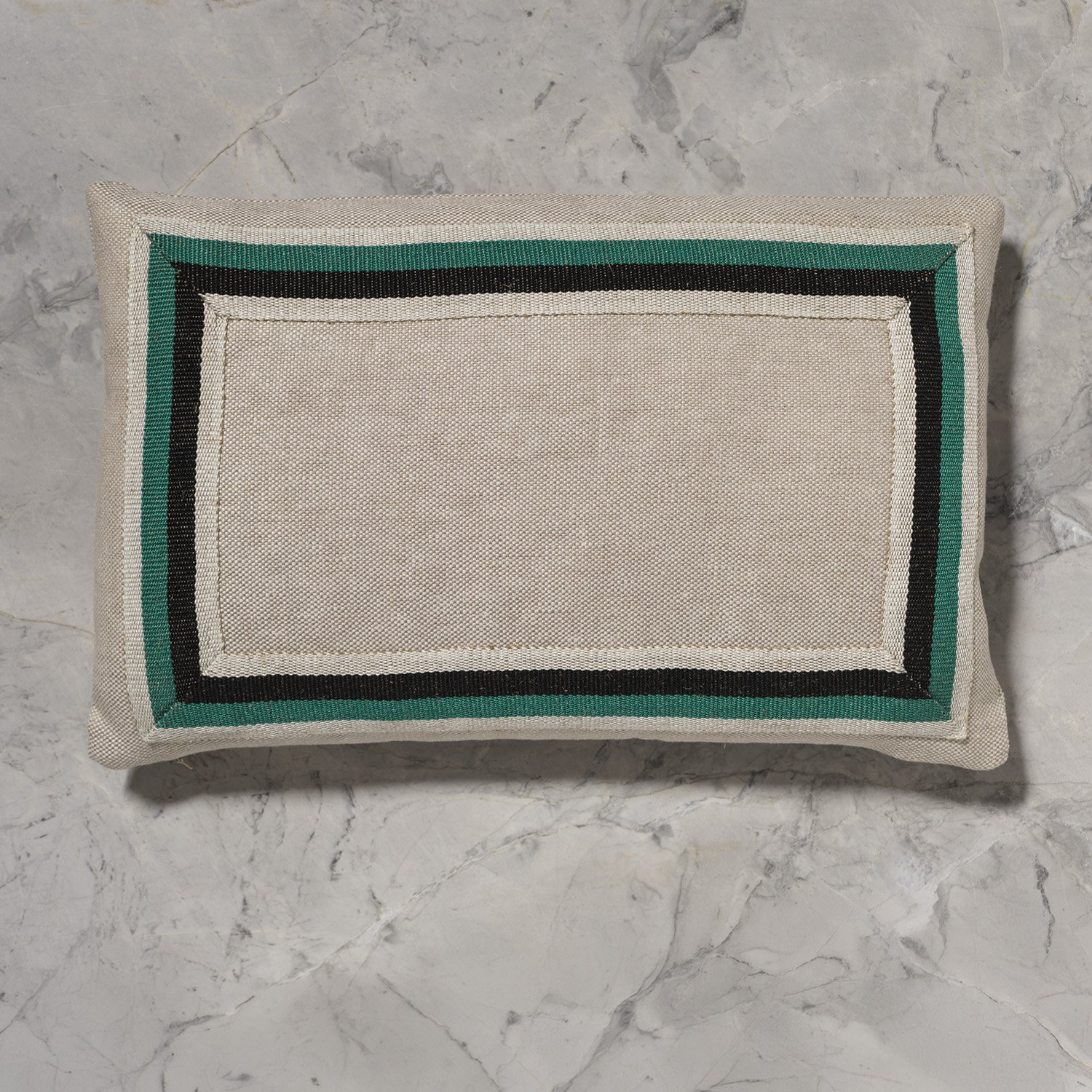 12x18" flax pillow with framed medium detail of Dorothy handwoven linen tape trim
