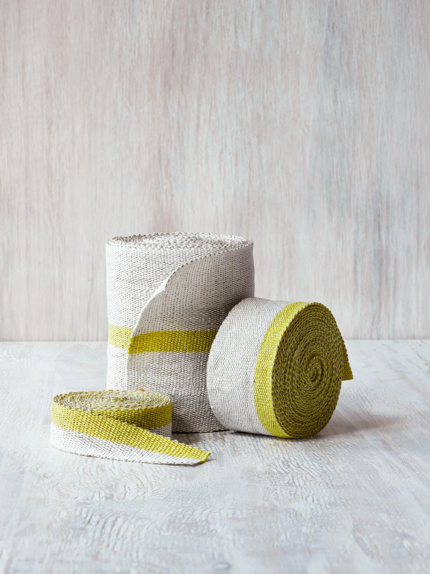 Fresh Yellow handwoven linen tape trim in a soft, bright yellow and white in narrow, medium and wide widths.