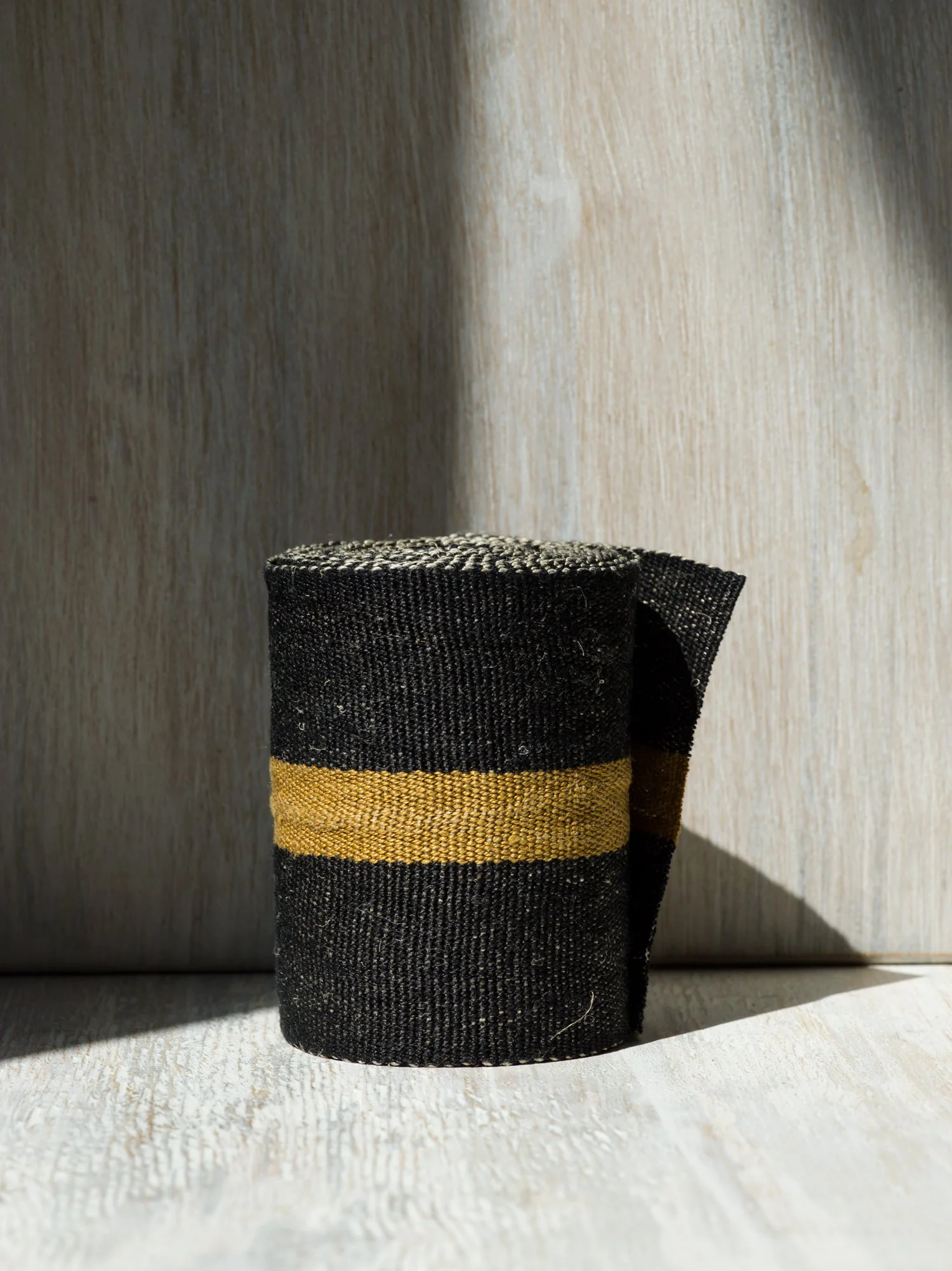 Modern Neutral I: Black and Bronze handwoven linen tape trim in black with a bold bronze band in wide width.