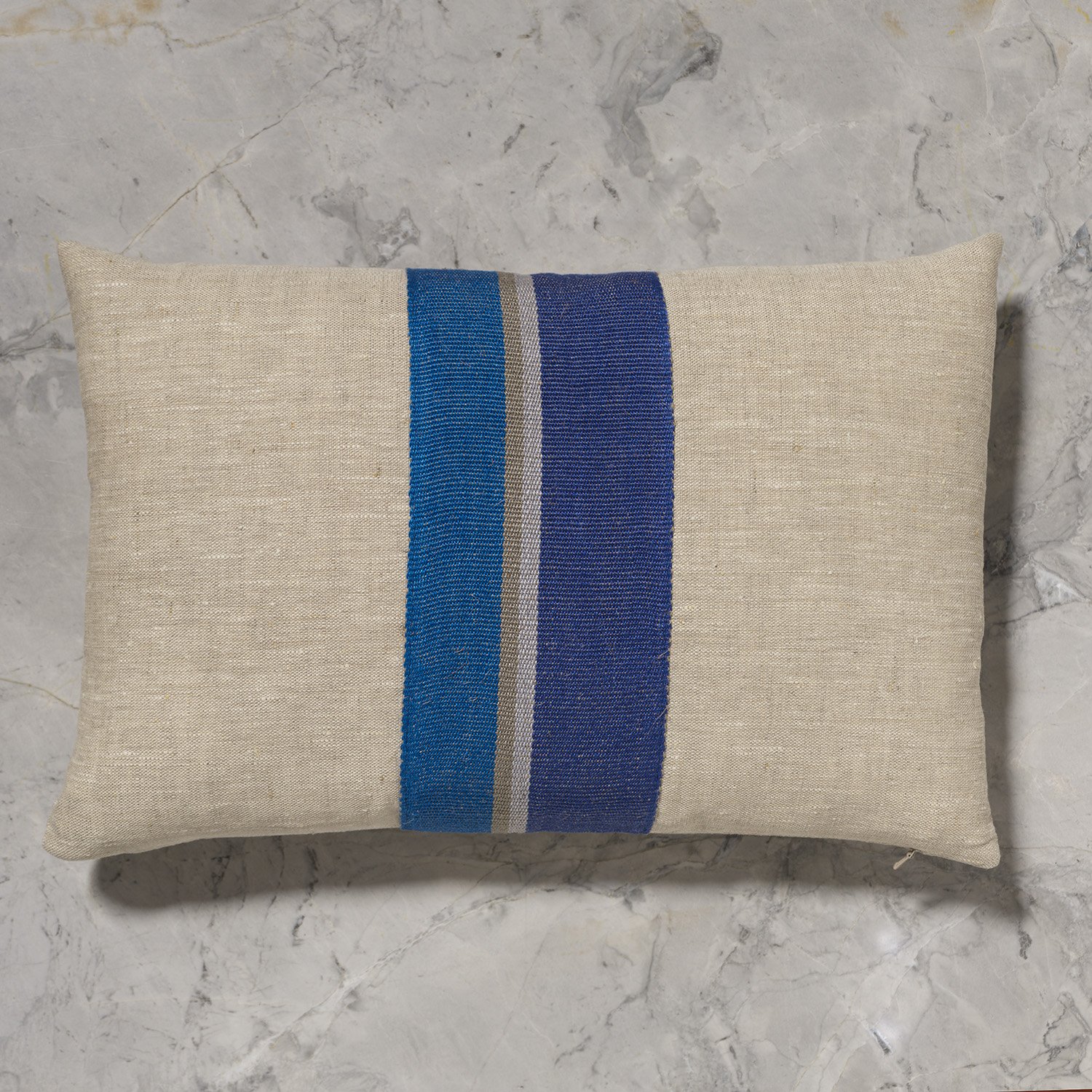 12x18" flax pillow with center wide detail of Ocean handwoven linen tape trim
