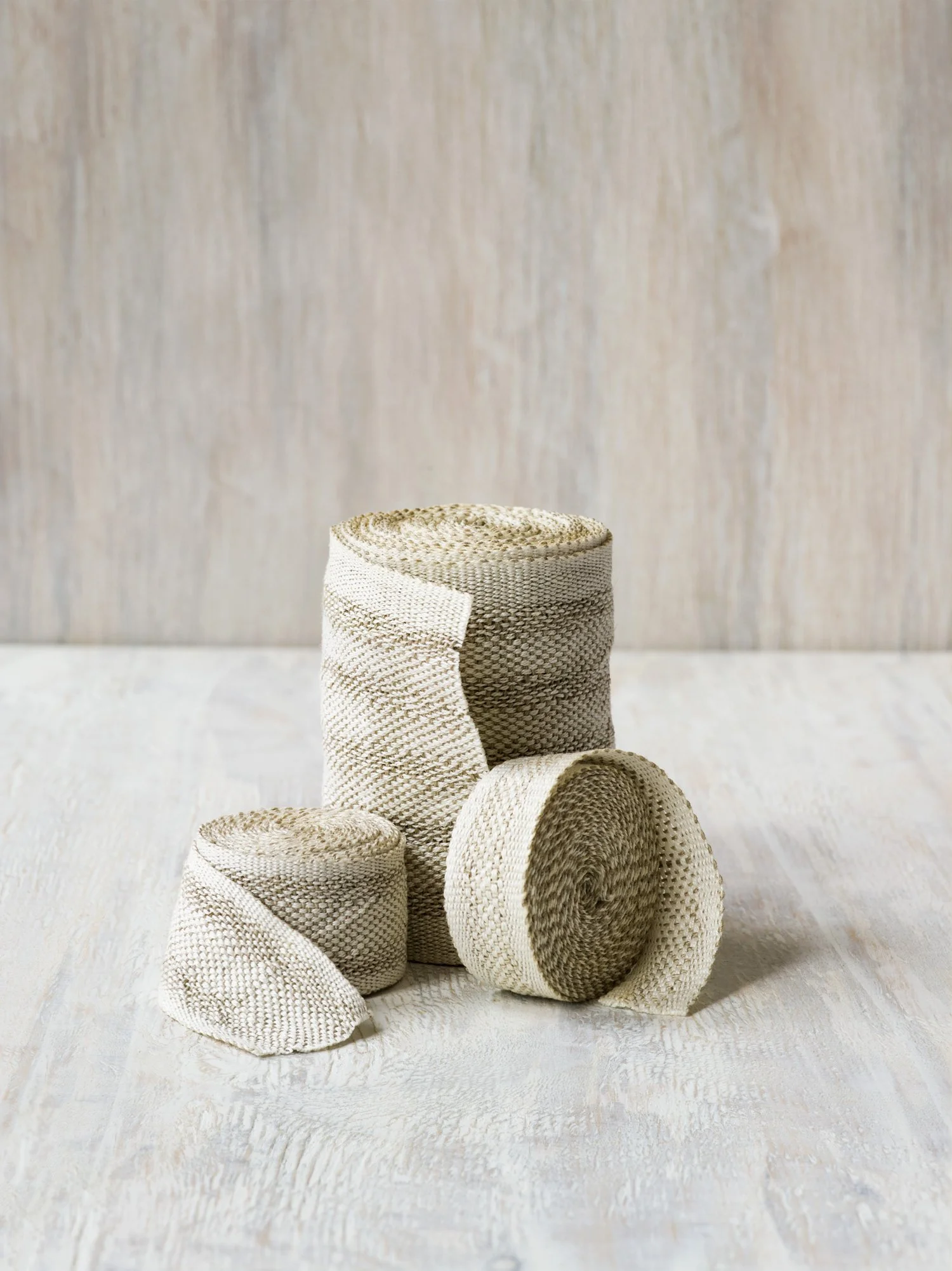 White Fretwork handwoven linen tape trim in a soft white patterned weave in narrow, medium and wide widths.