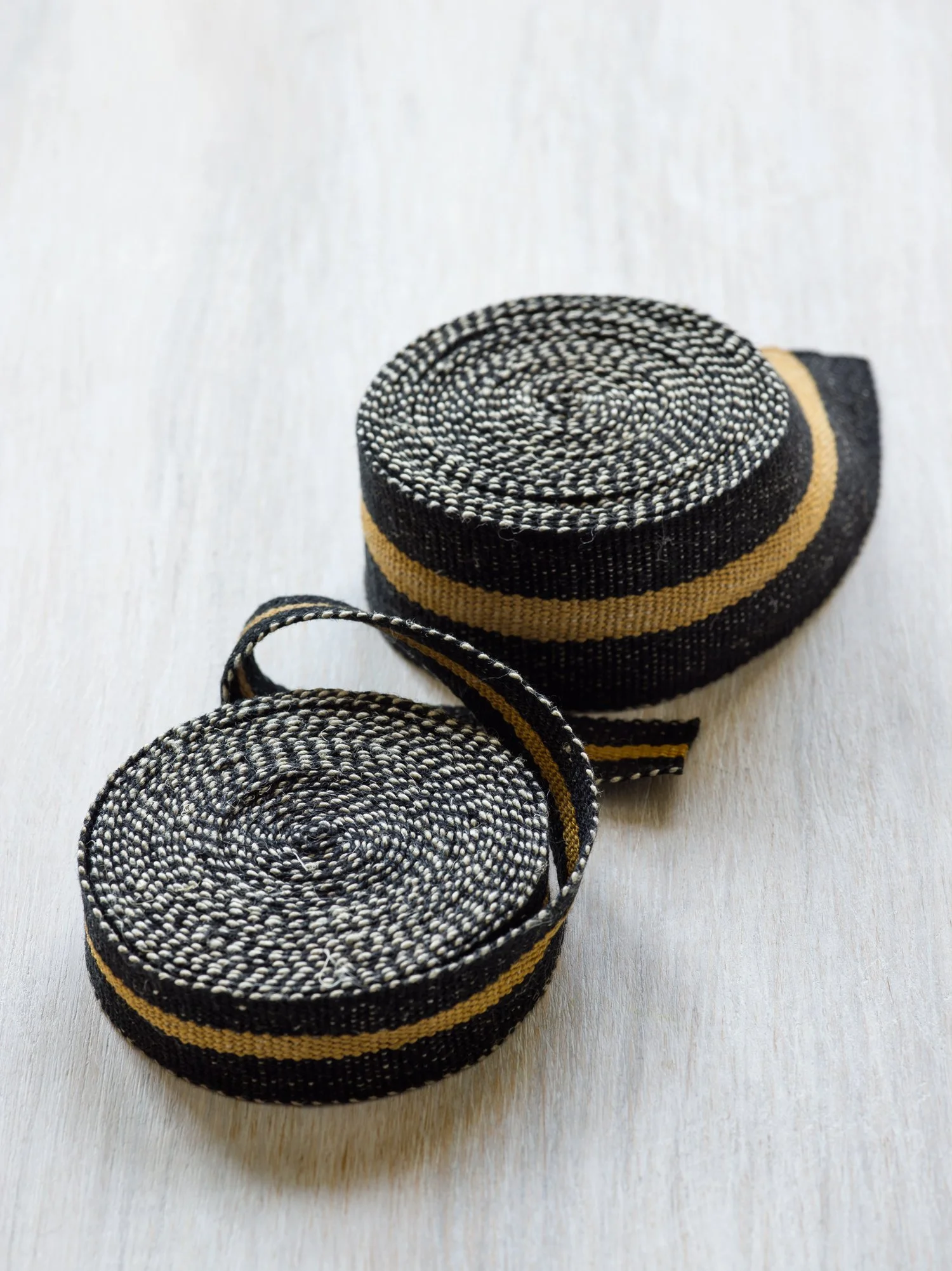 Modern Neutral I: Black and Bronze handwoven linen tape trim in black with a bold bronze band in narrow and medium widths.
