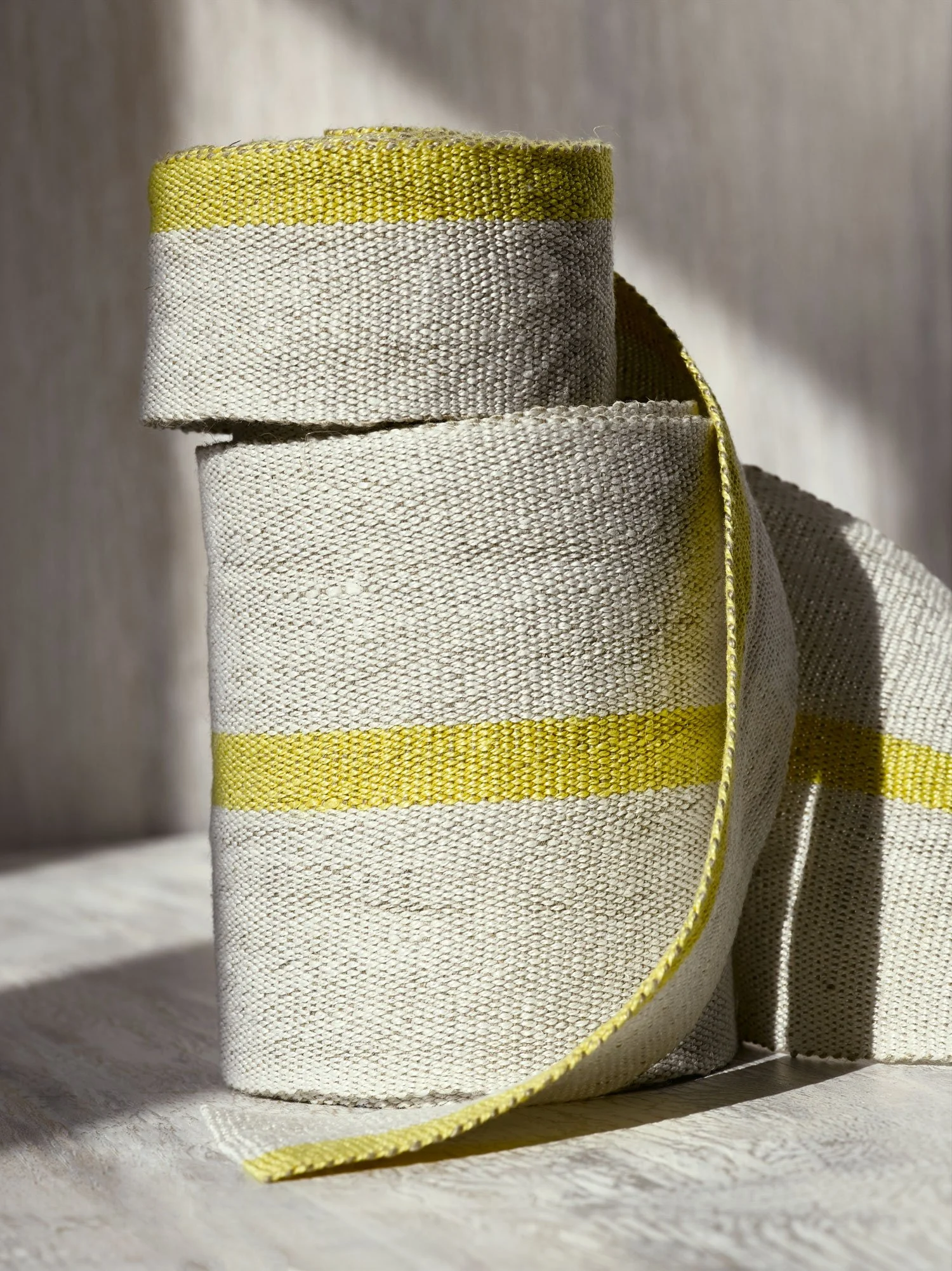 Fresh Yellow handwoven linen tape trim in a soft, bright yellow and white in medium and wide widths.