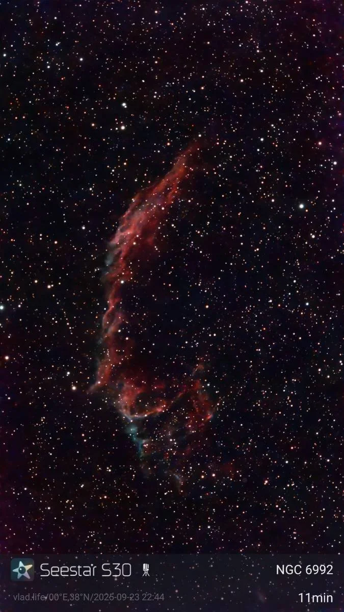 A detailed image of a space nebula, with numerous stars and colorful gas clouds, labeled 'Seestar S30' and 'NGC 6992' in the bottom left corner.