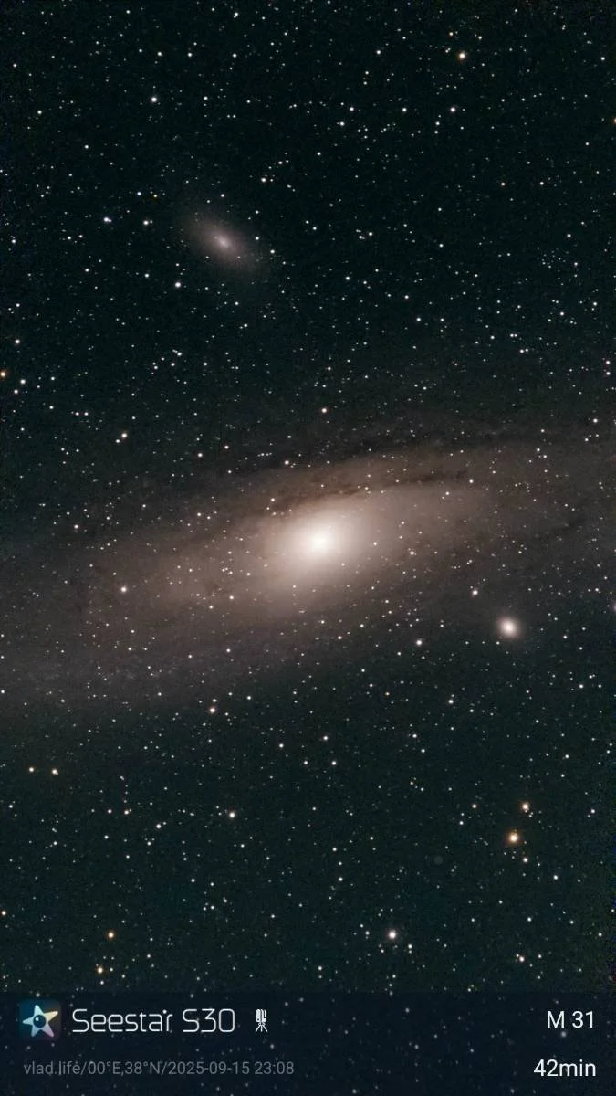 A view of a galaxy and numerous stars in space, captured with a Seestar S30 telescope in 42 minutes at M31.