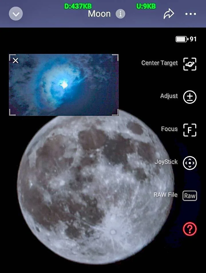 A photograph of the moon with a close-up view of its surface, showing craters and lunar features. An inset image captures a bright spot in the sky, possibly a celestial object or phenomenon, framed within a camera or telescope interface.