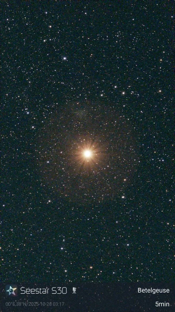 A clear night sky filled with numerous stars and a bright, glowing star or planet near the bottom center.