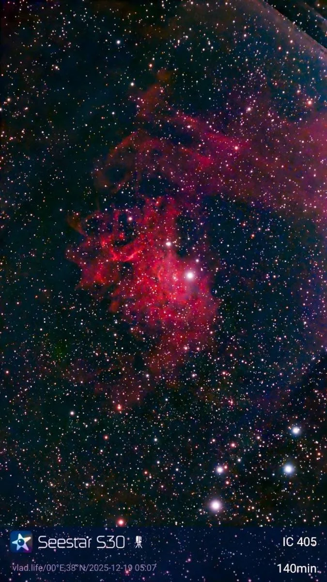 A vibrant photo of outer space showing a colorful nebula with numerous stars surrounding it.