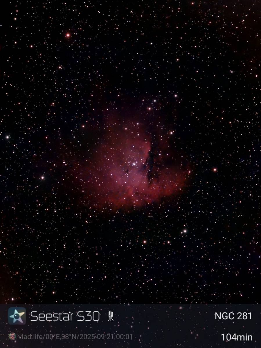 Deep space photo of the nebula NGC 281, also called the Pacman Nebula, with stars scattered throughout. Displayed information includes telescope Seestart S30, coordinates 00°E, 38°N, observation date September 21, 2025, and duration 104 minutes.