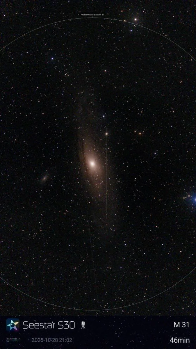 Image of a star-filled night sky with the Andromeda galaxy and the Messier 31 galaxy labeled, captured with a Seestar S30 telescope, dated October 28, 2025.