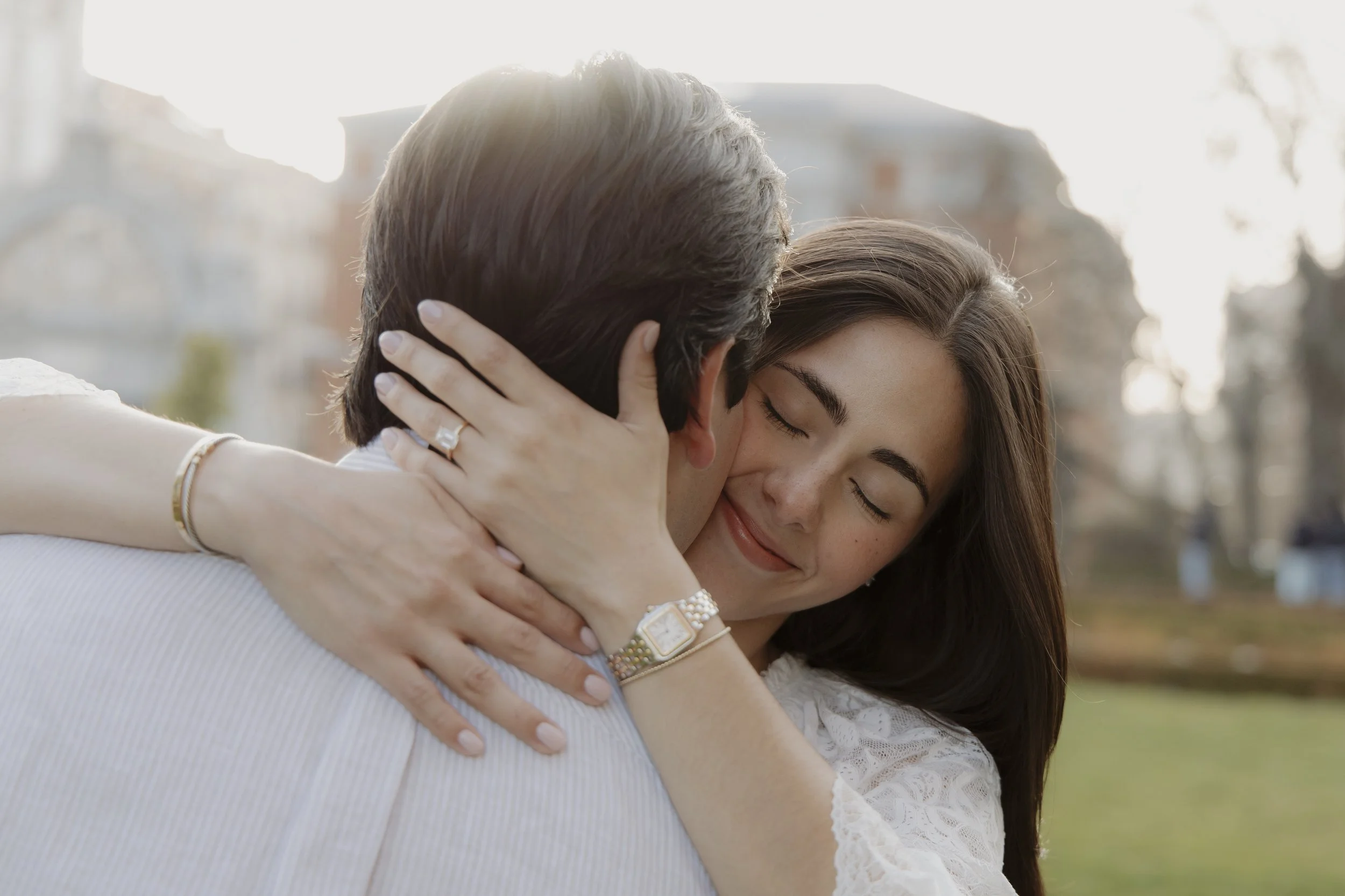 Marriage proposal in Retiro Park Madrid with natural and candid emotions with the new engagement ring.