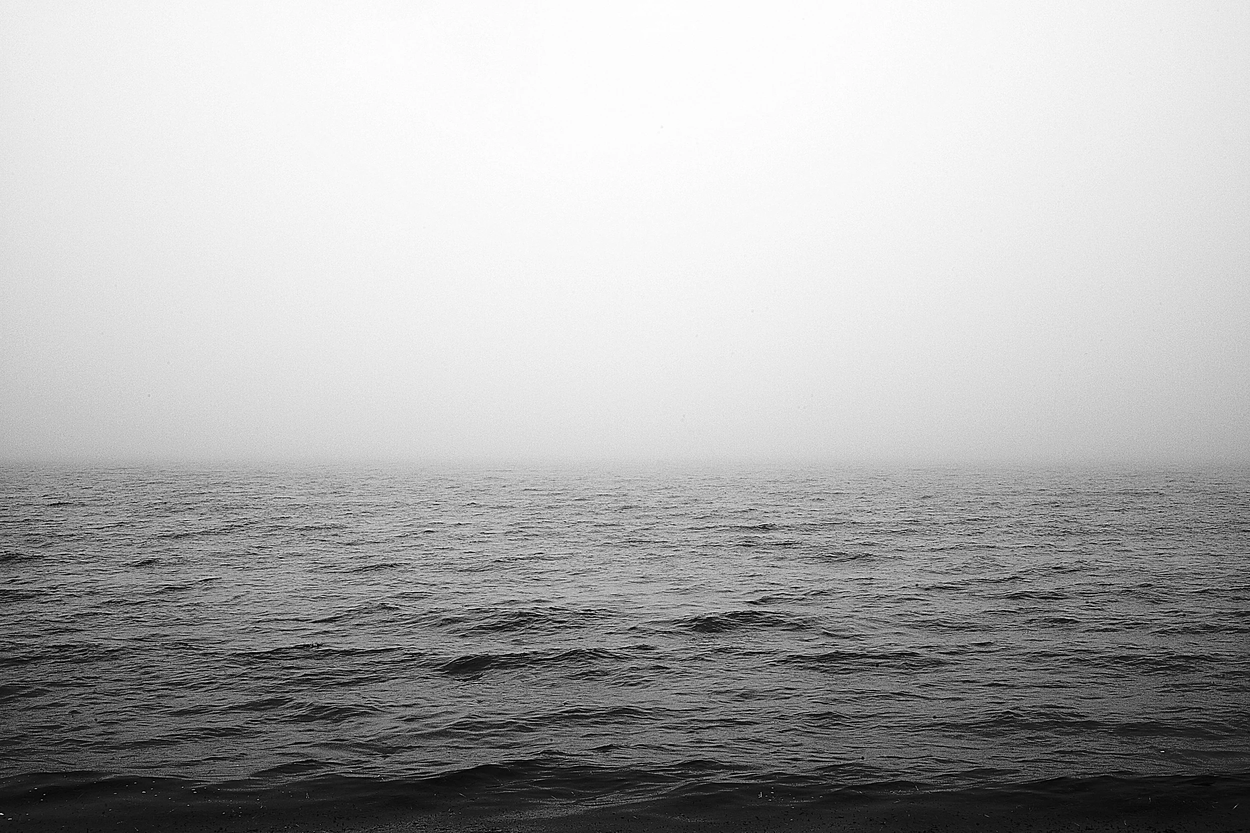 Black and white photograph of the ocean out on Nauset Beach Cape Cod