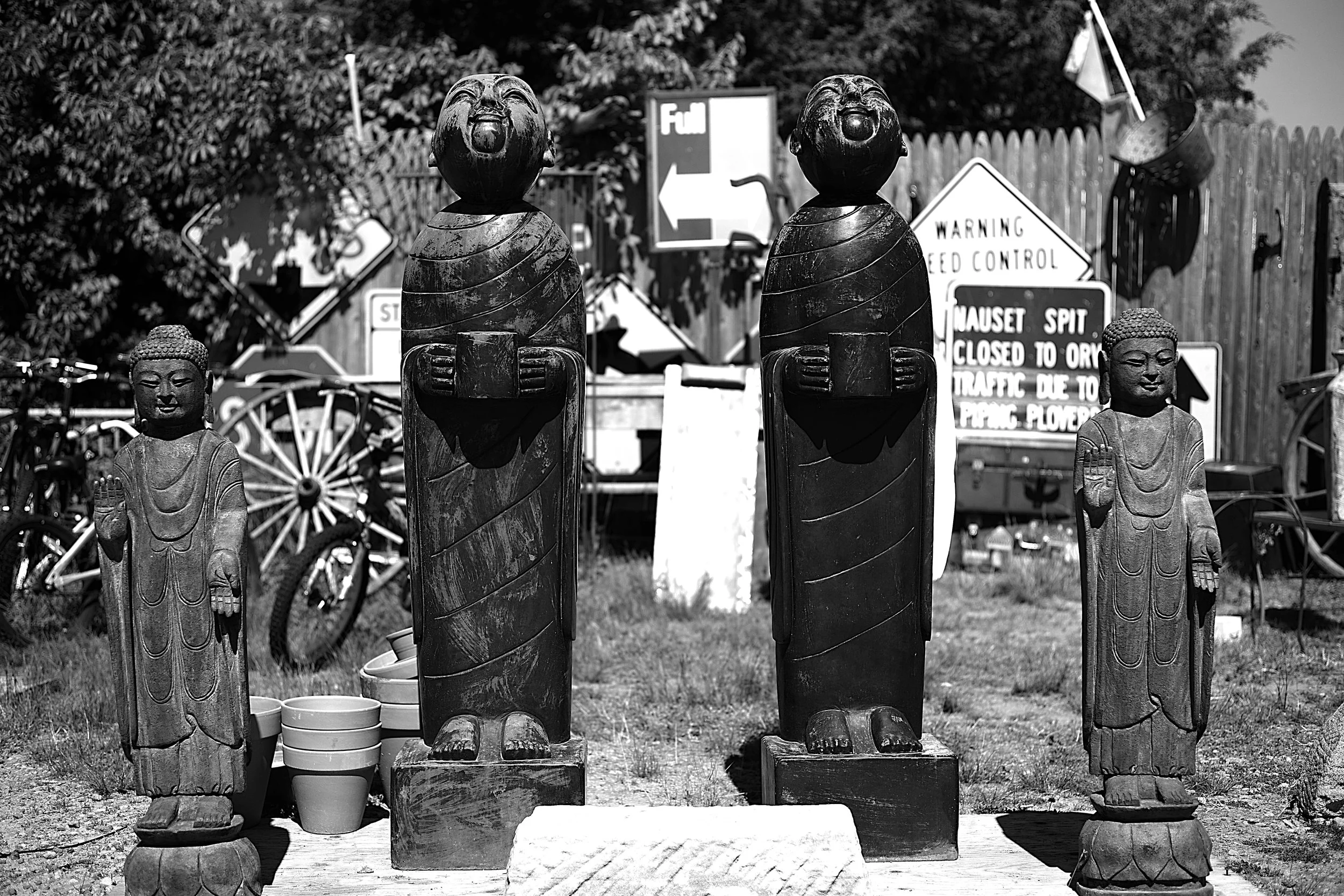 Black and white photograph of the twin Buddhas at Buddha Bob's at Eastham