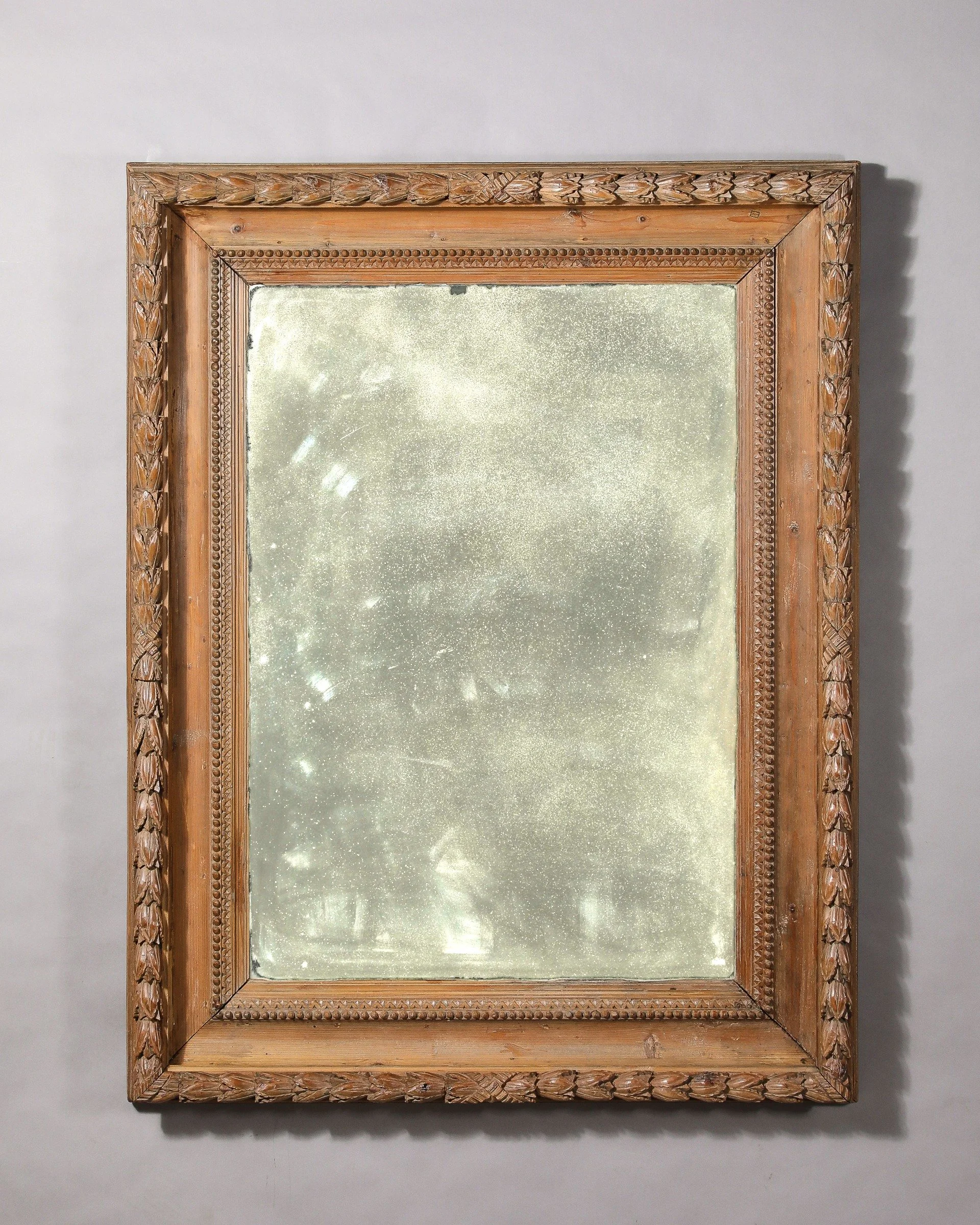 A Large Rectangular Carved Pine Mirror Northern Italian, 17th C