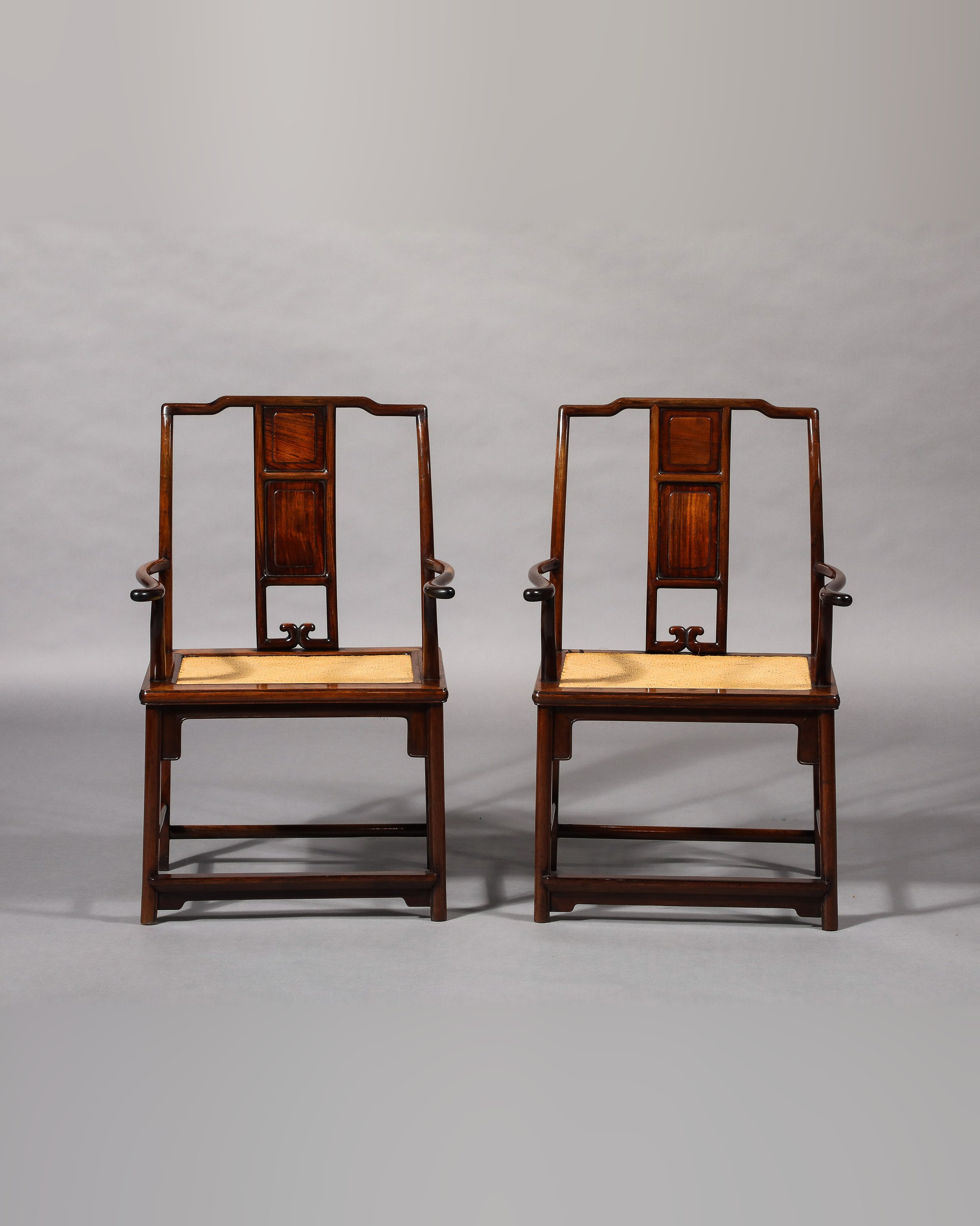A Pair of Chinese Huanghuali ‘Official’s Hat’ Armchairs (Guanmaoyi) · Mid Qing Dynasty
