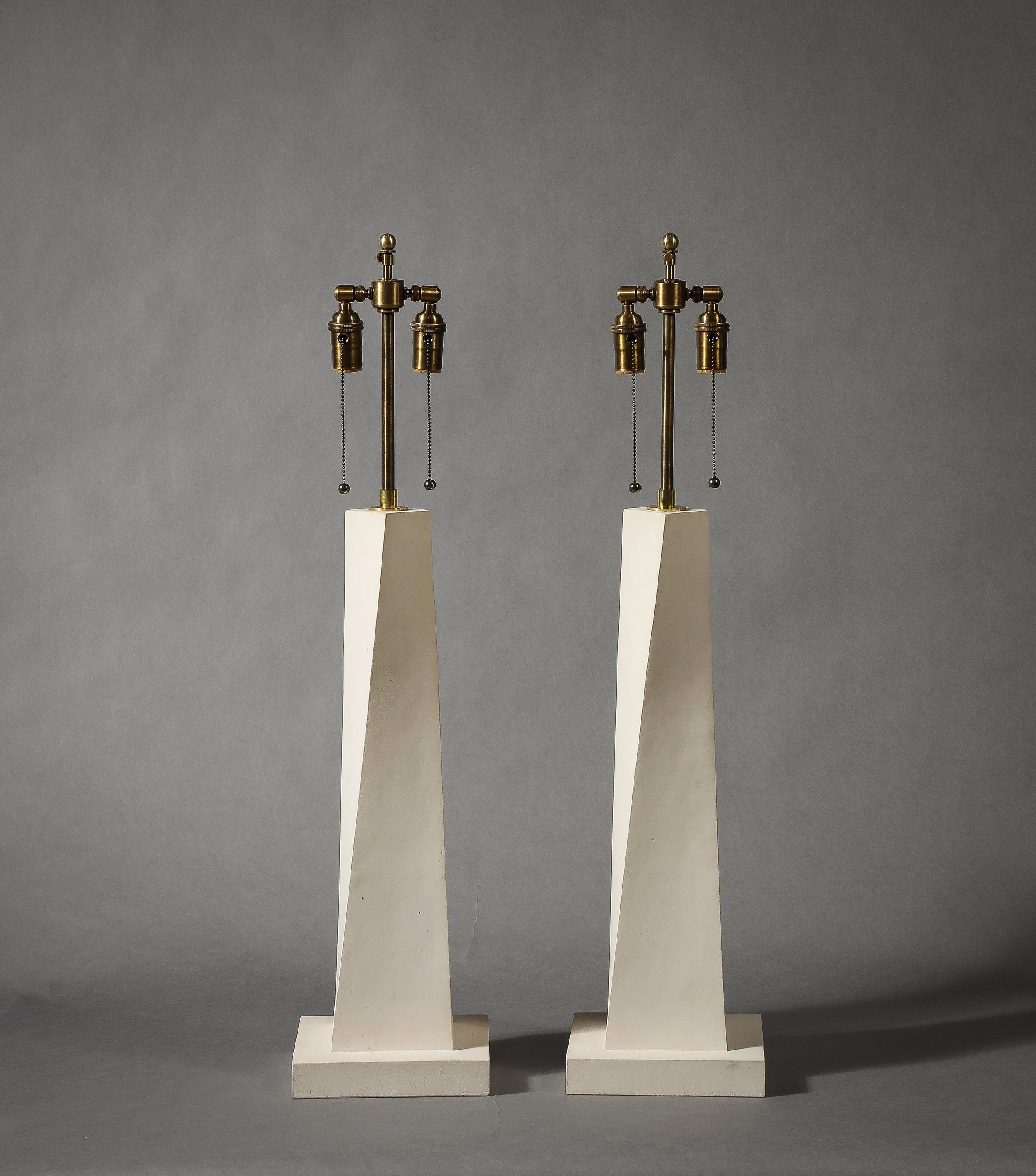 A Tall Pair of Contemporary Coade Stone Lamps in the style of Jean-Michel Frank