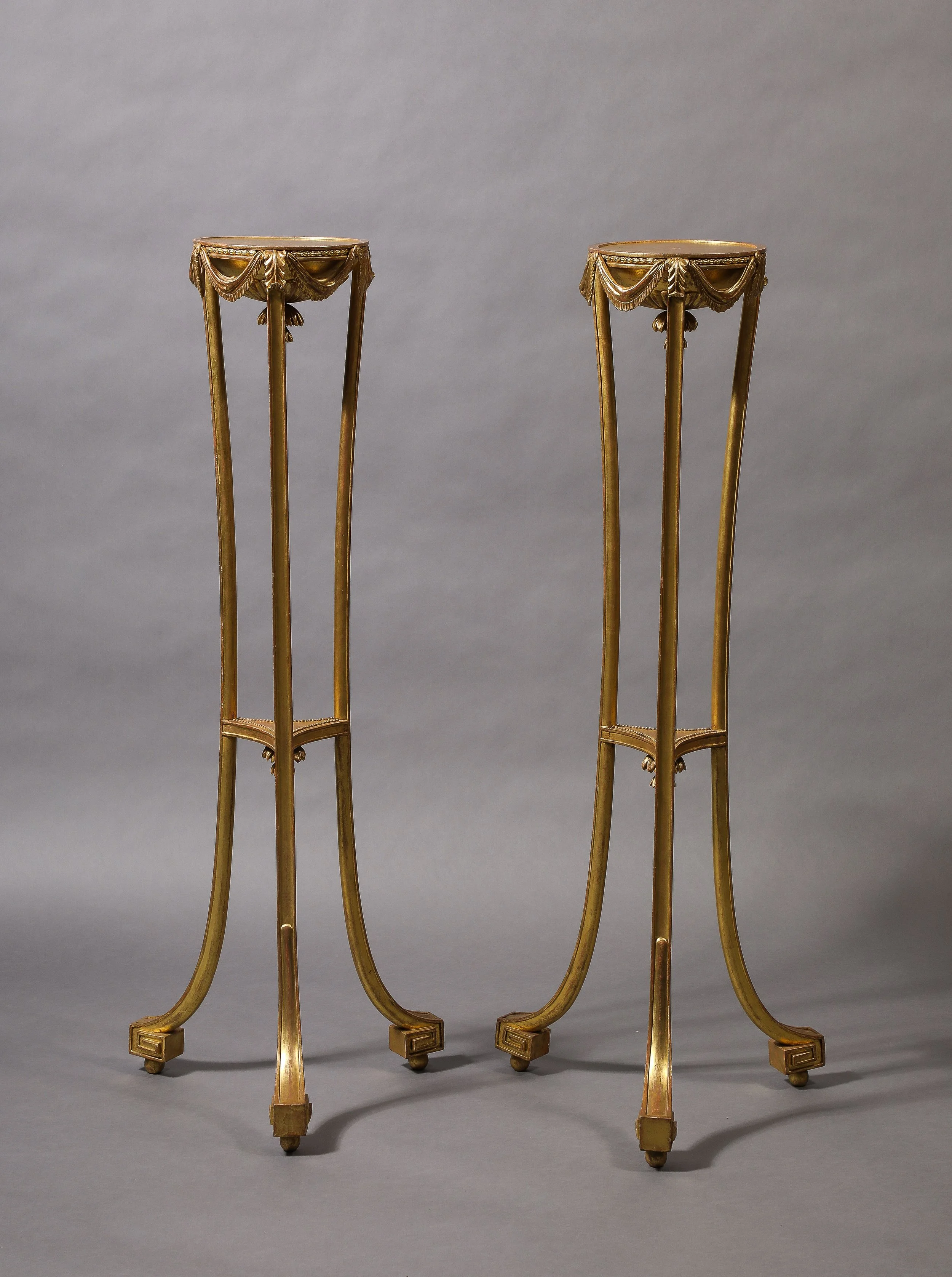 A Pair of George III Gilt Neoclassical Stands