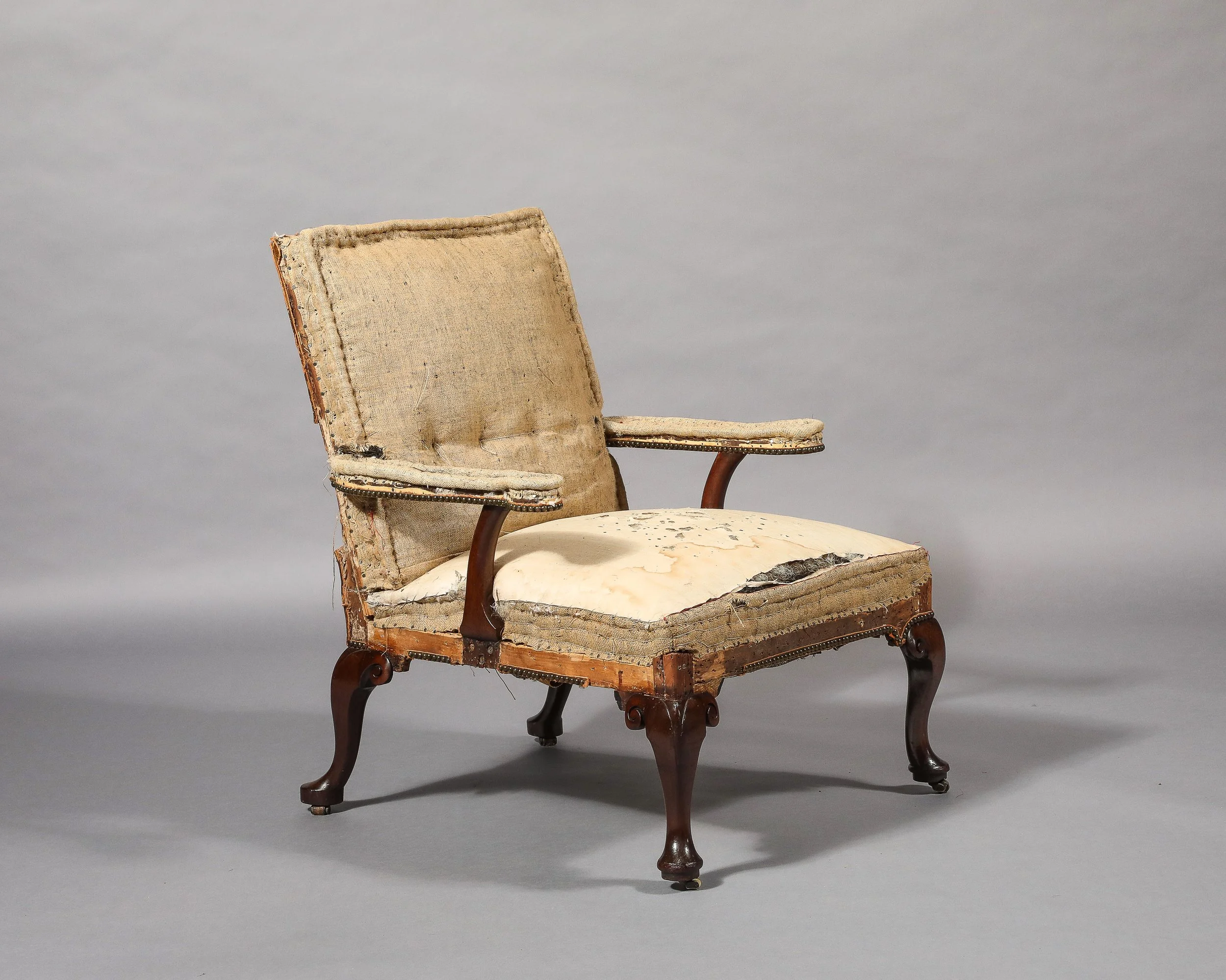 An Early George III Irish Mahogany Library Chair
