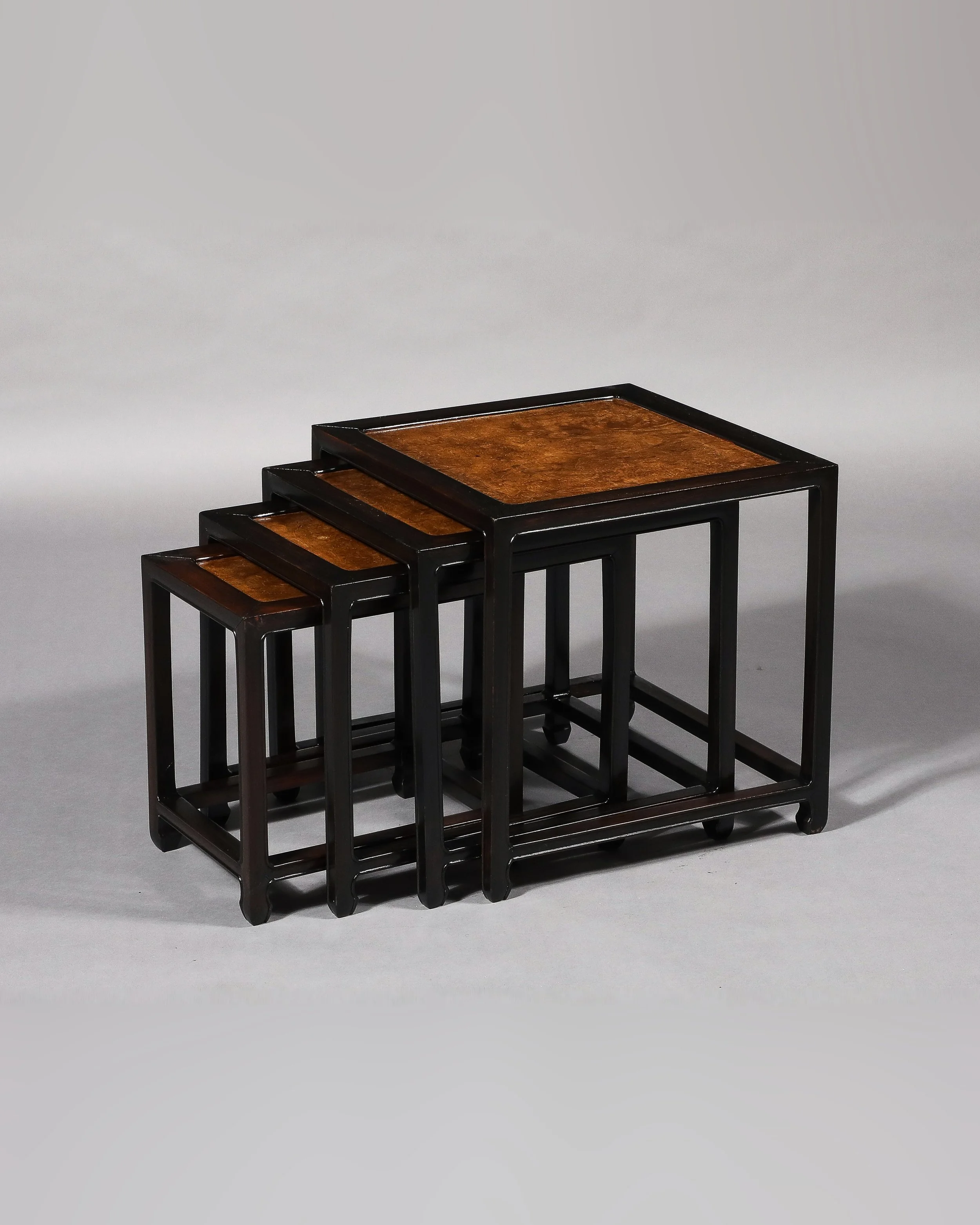 A Set of Four Chinese Hardwood Nesting Tables · Hong Kong, mid-to-late 20th Century