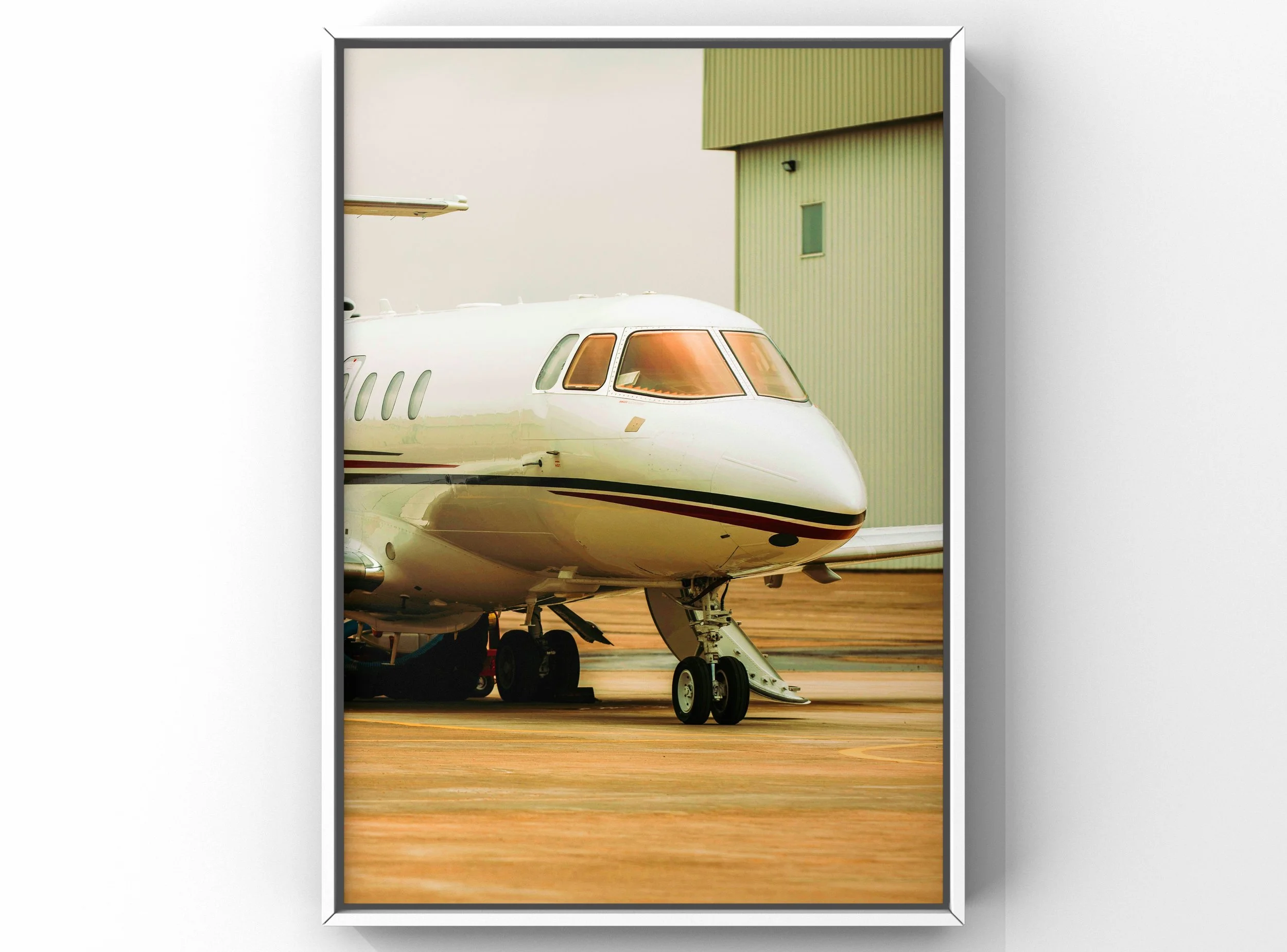Aircraft exterior detailing with clean nose and fuselage on airport ramp in Raleigh-Durham RDU