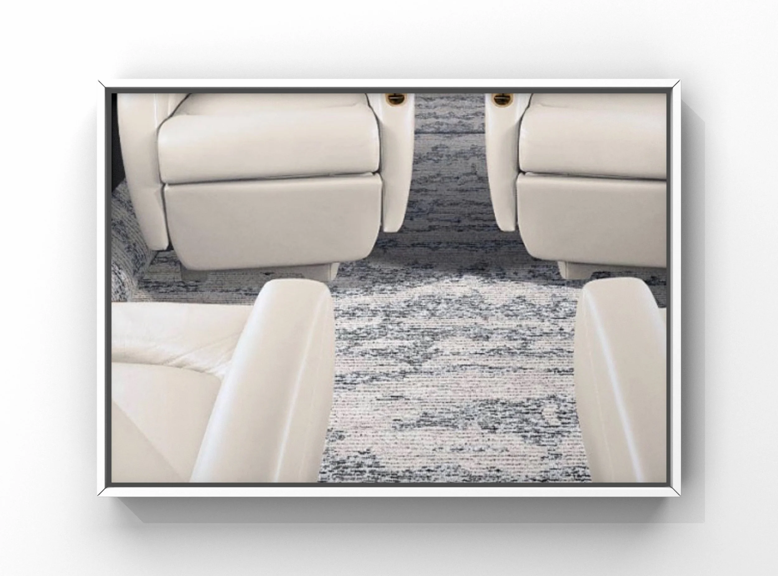 Aircraft interior carpet cleaning and extraction service beneath seating in private jet cabin at RDU
