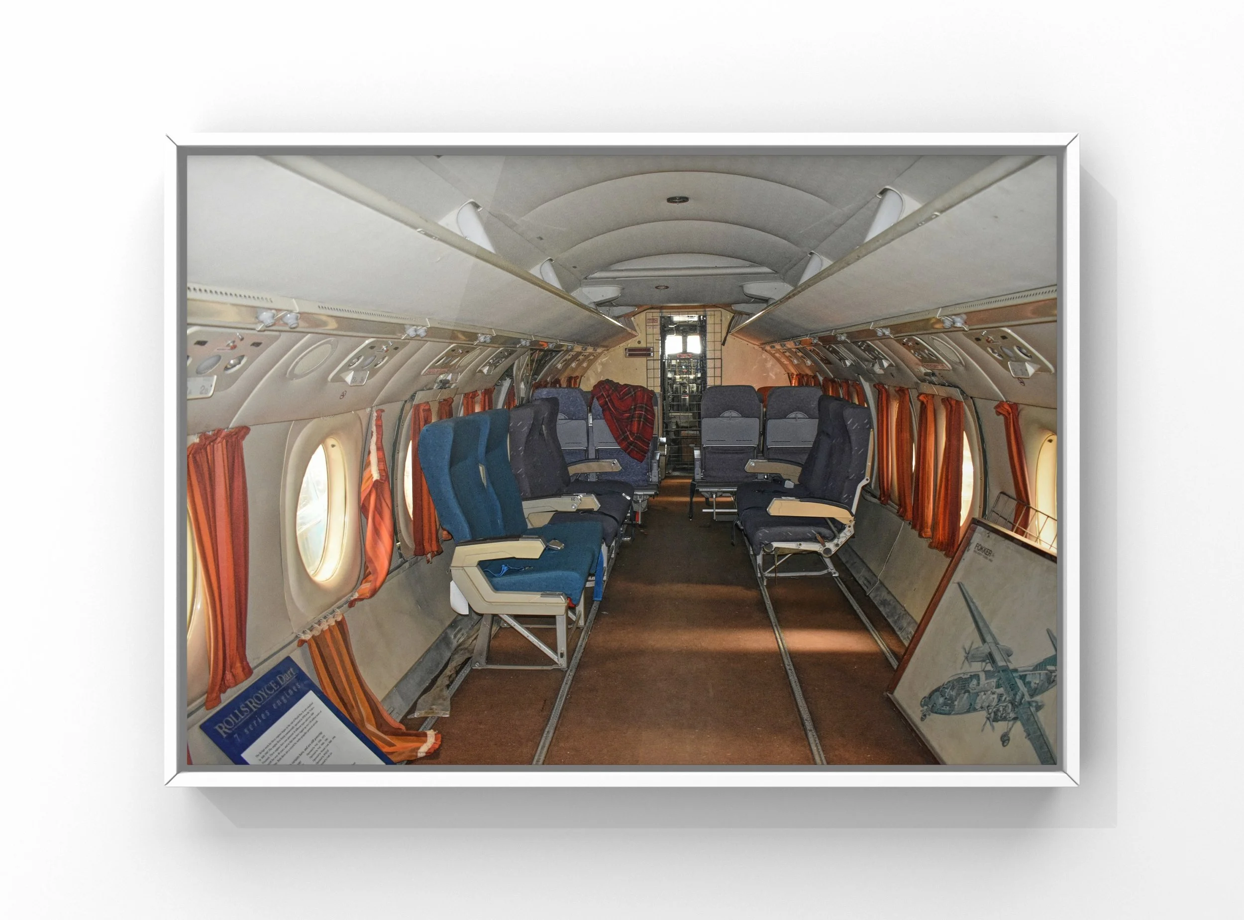 Private jet interior detailing showing clean cabin seating and aisle inside aircraft in Raleigh NC
