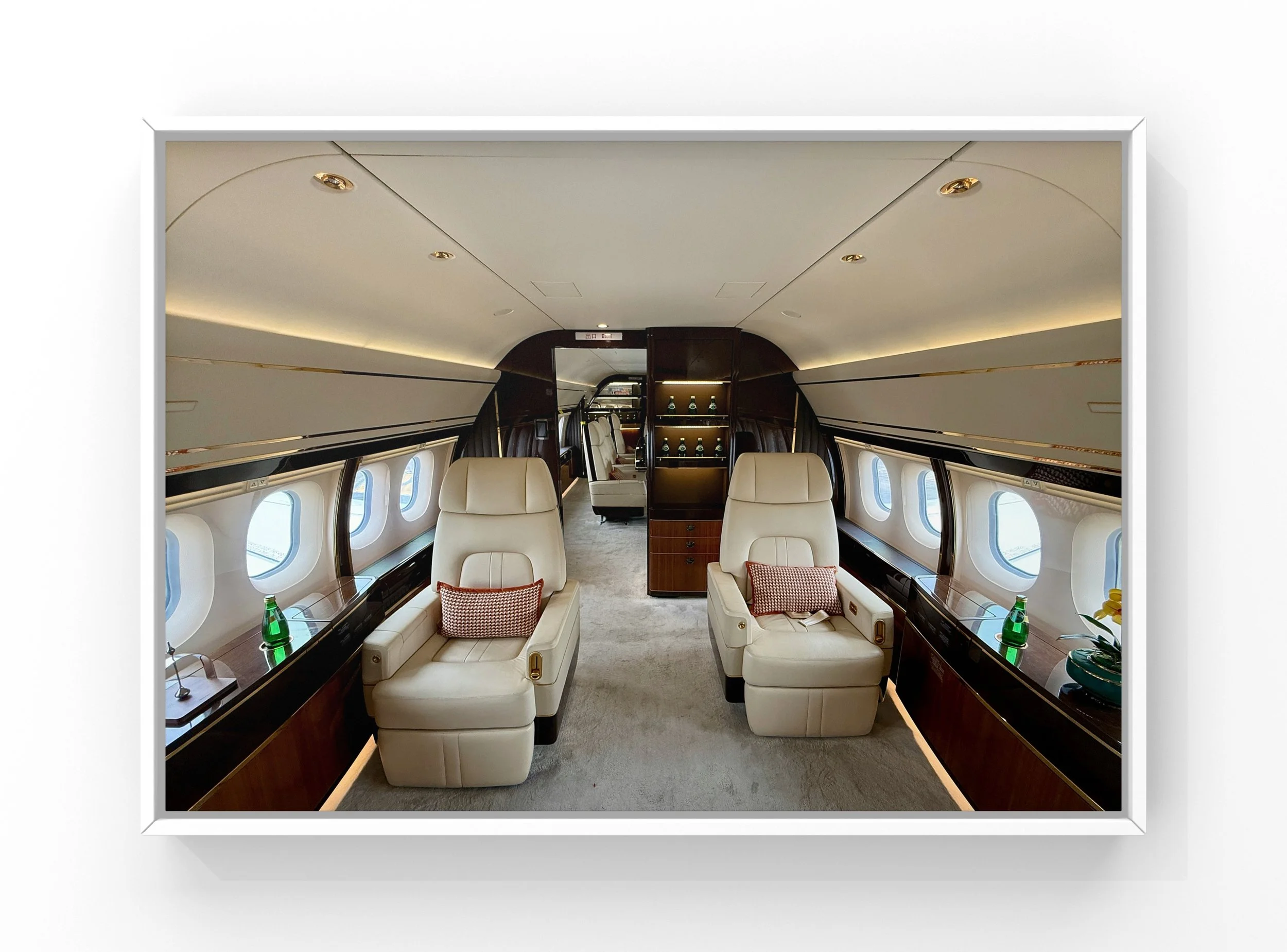 Private jet interior after detailing showing clean leather seating and carpeted cabin in Raleigh NC