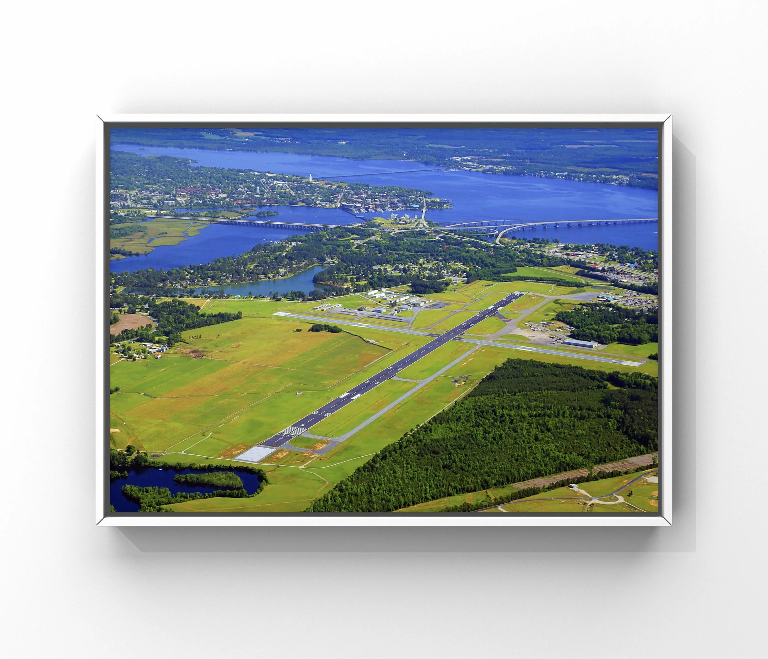 Interior aircraft detailing at the Coastal Carolina Regional Airport (EWN) showing runway, taxiways, and surrounding coastal landscape in NC