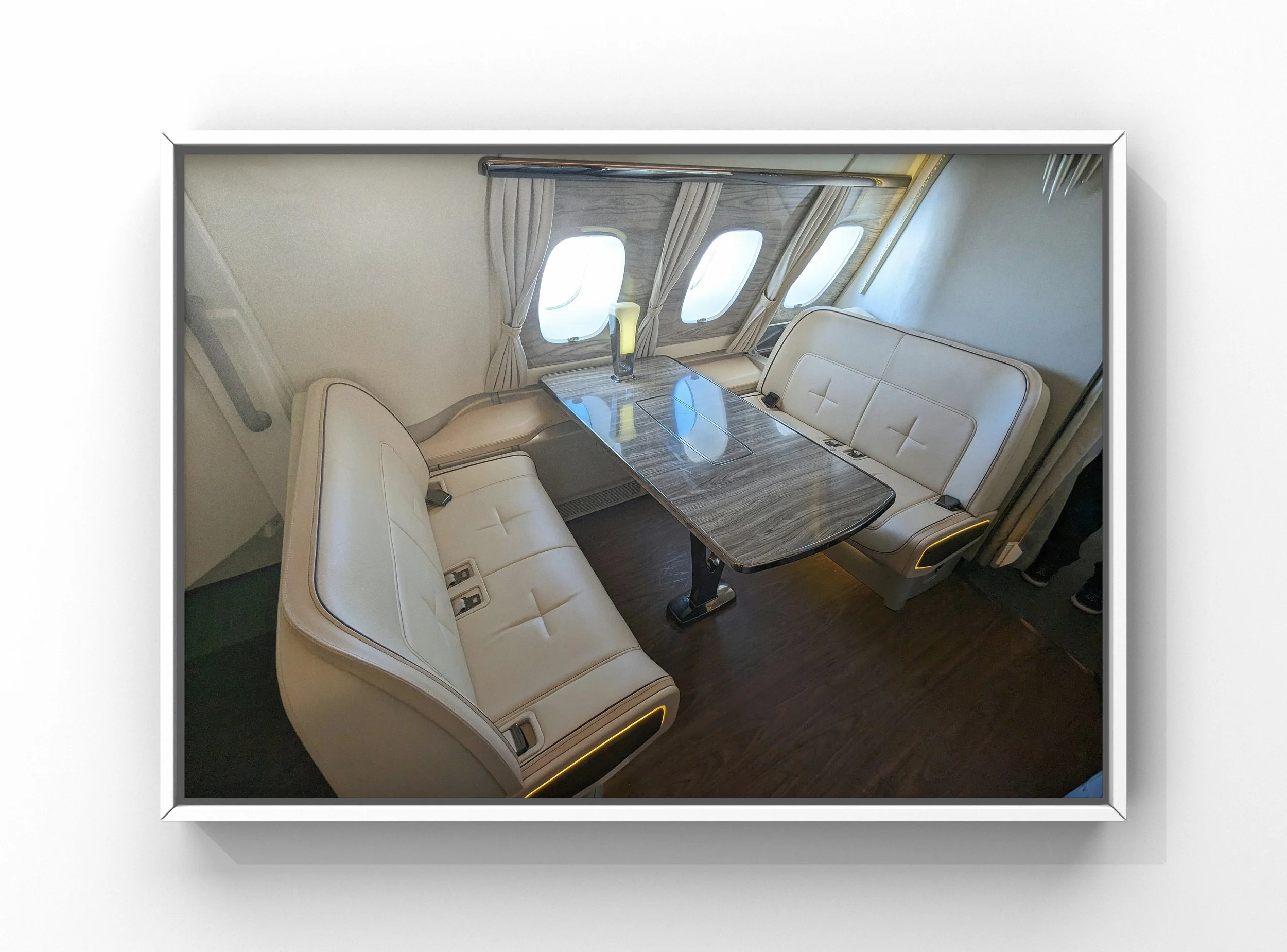 Aircraft interior detailing with cleaned leather seats and cabin table inside private jet for Raleigh-Durham RDU