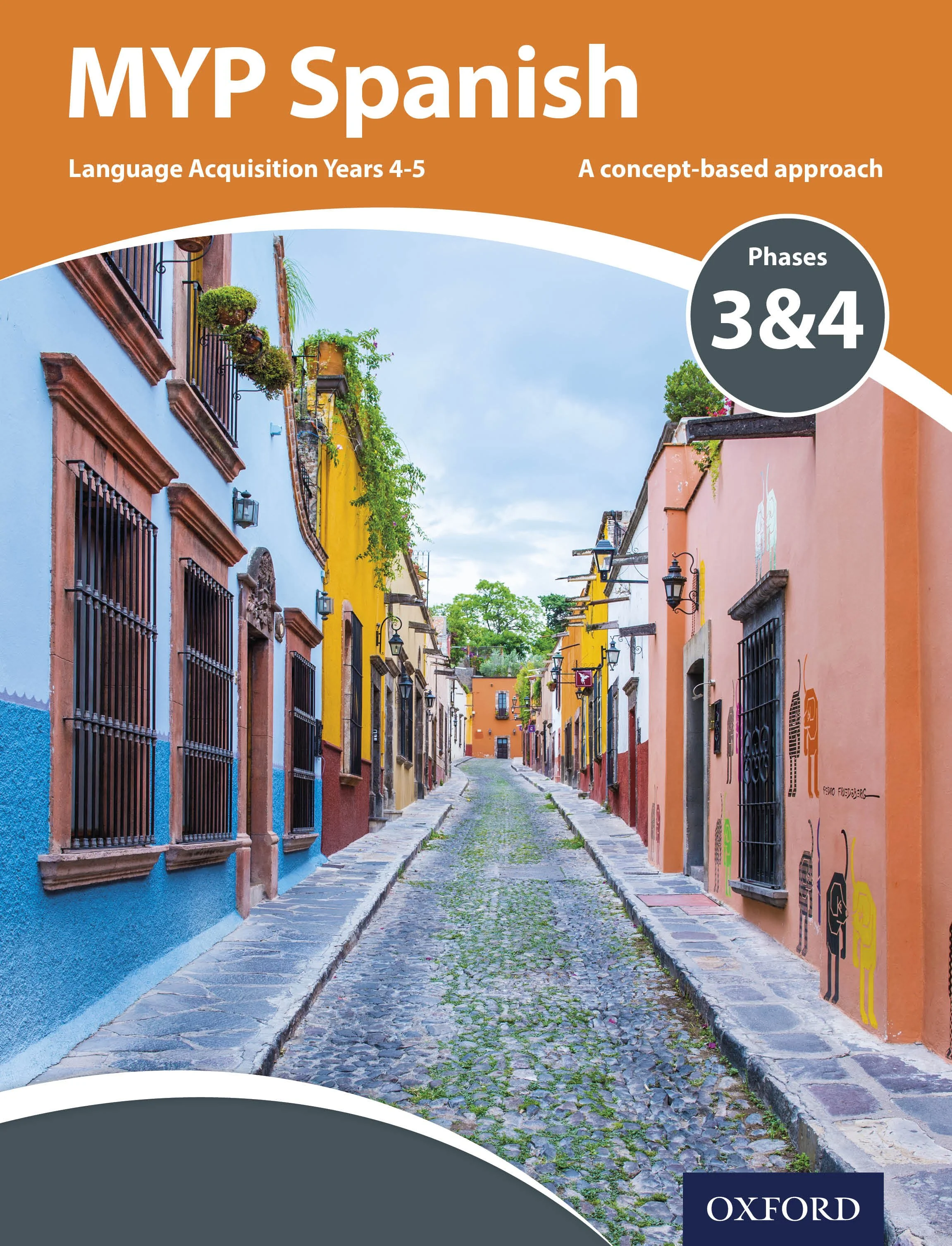 Cover of a textbook titled 'MYP Spanish' with a colorful street scene of buildings painted in blue, yellow, pink, and white, and a cobblestone street in the foreground.