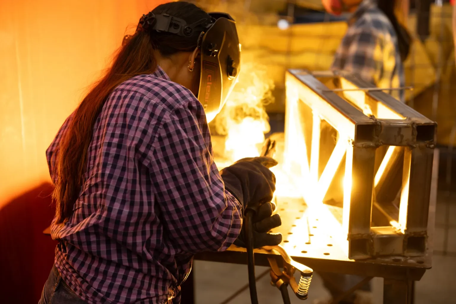A student welds pieces of the frame during mounting week after another student who worked on the float previously instructed her.“A lot of us come into this program with no experience at all,” said civil engineering student Kelly Luna-Flores. “That’s