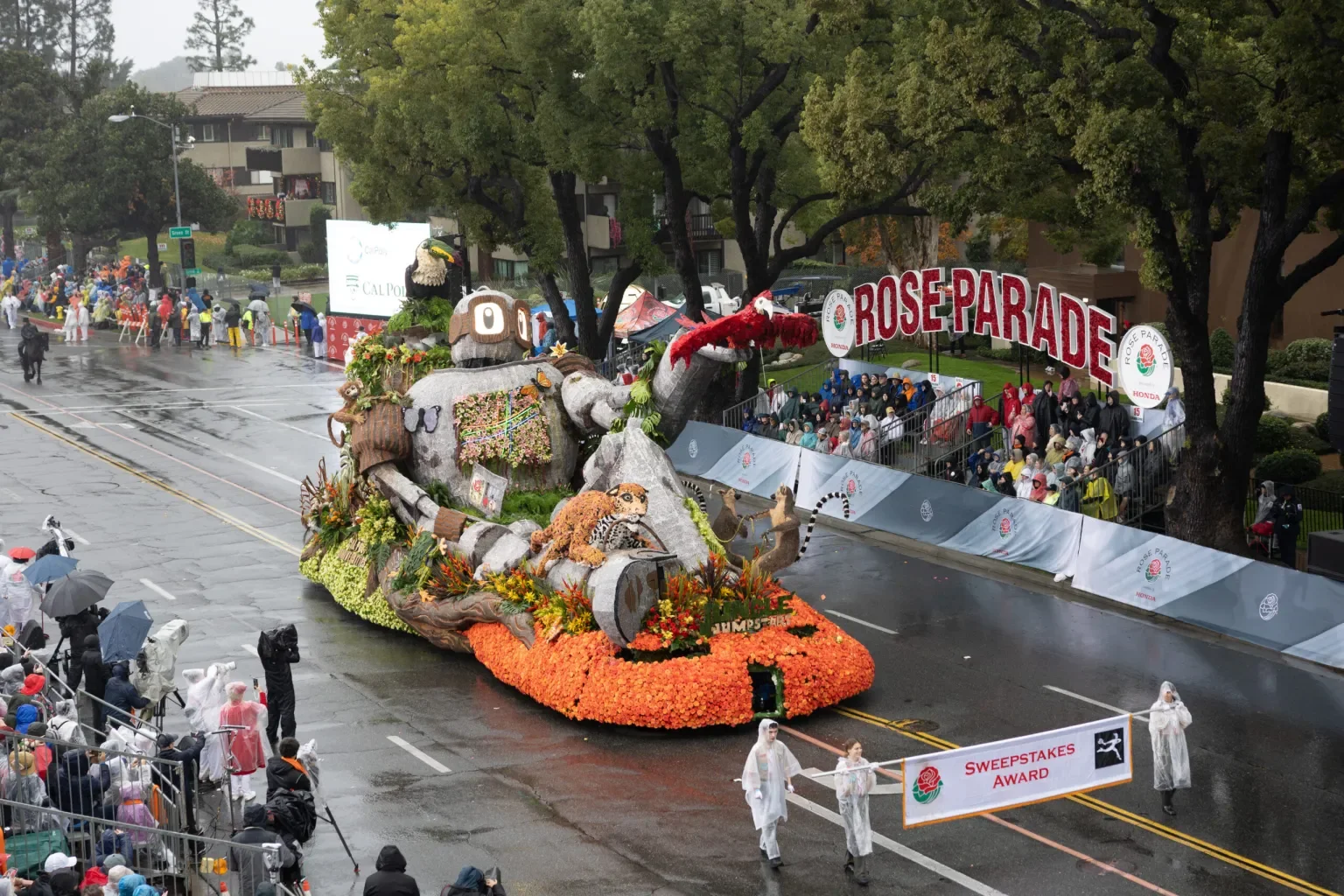 Cal Poly University’s float rolls down Colorado Blvd. during the 137th annual Rose Parade in front of thousands of spectators. It rained heavily during the parade for the first time since 2006, and umbrellas were not allowed. 