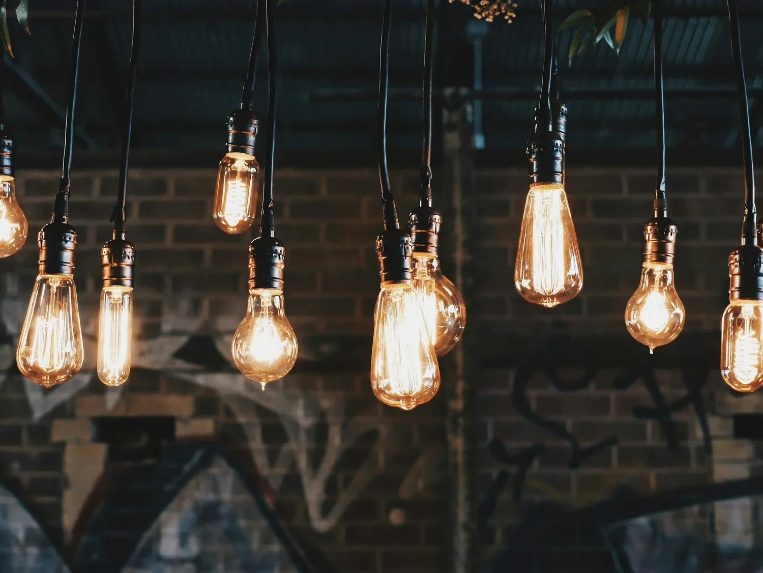 Illustration of decorative hanging lights representing home lighting installation services