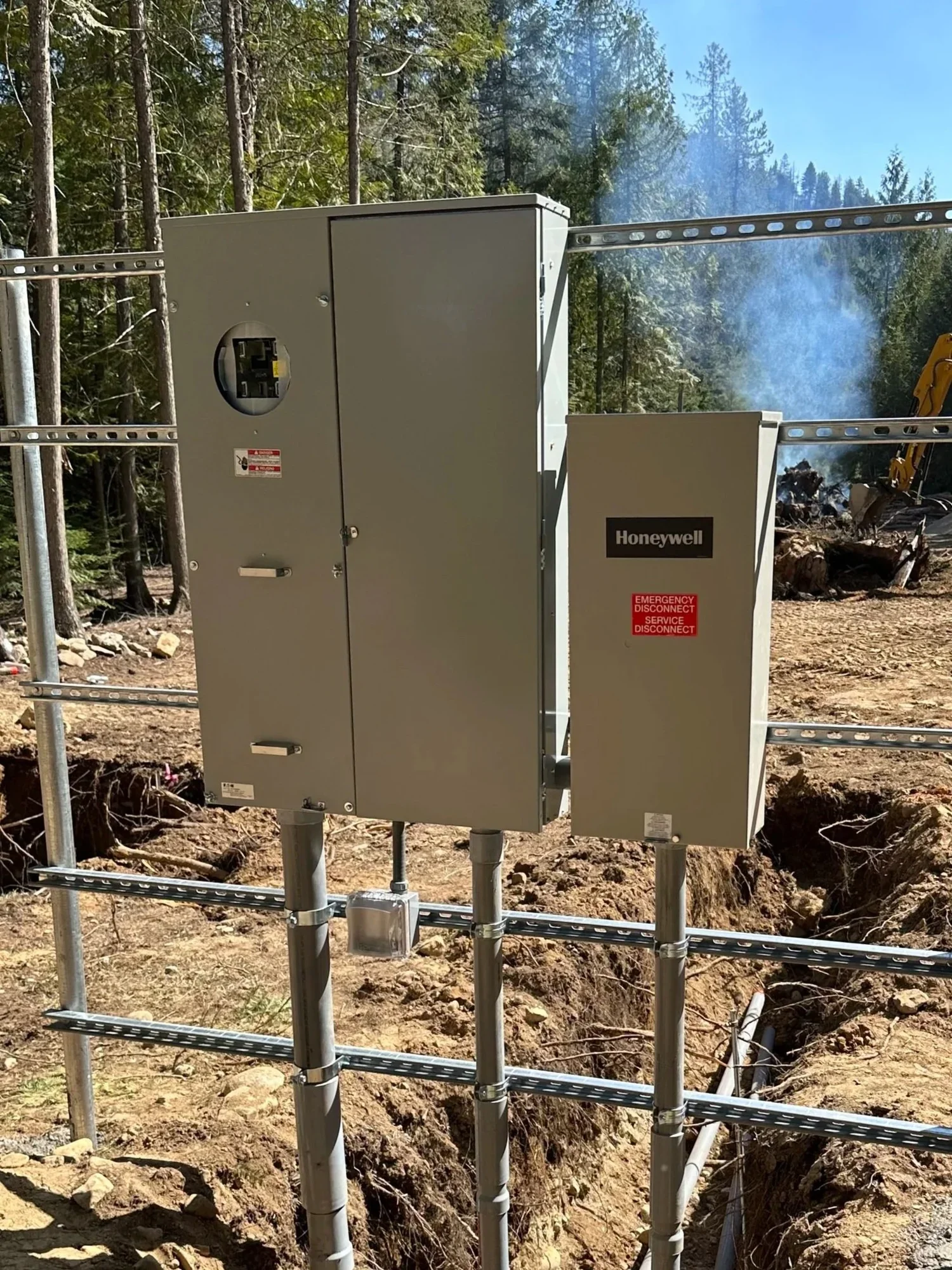 New electrical service installed on bare land bringing power to property in Sagle Idaho