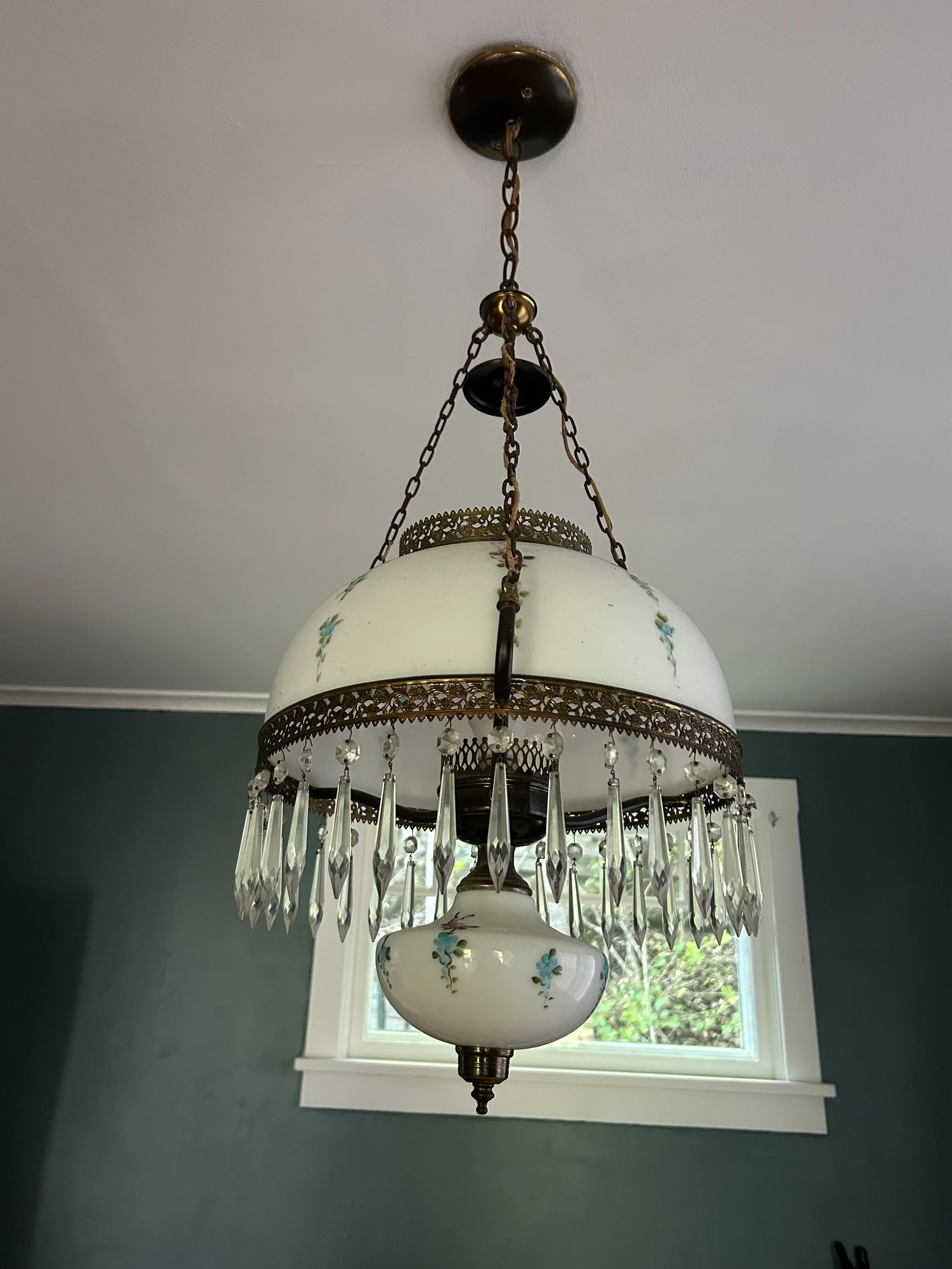 Antique light fixture in a 1912 home in Wallace Idaho before electrical upgrade