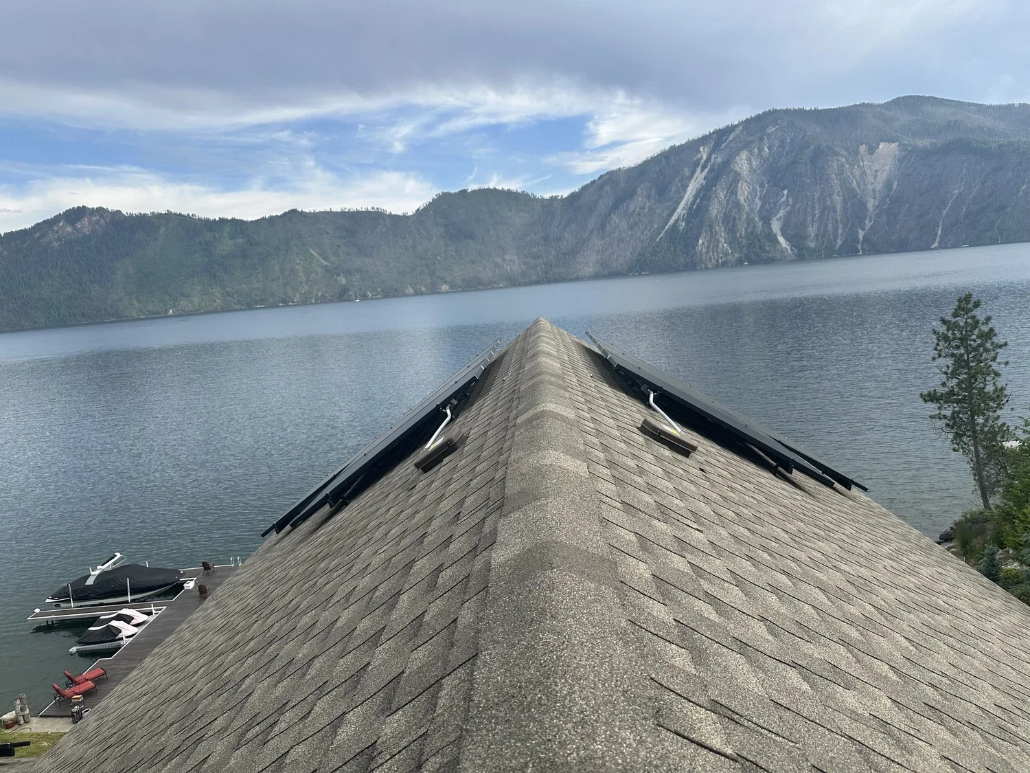 Roof-mounted solar panel system installed in North Idaho by Honest Electric