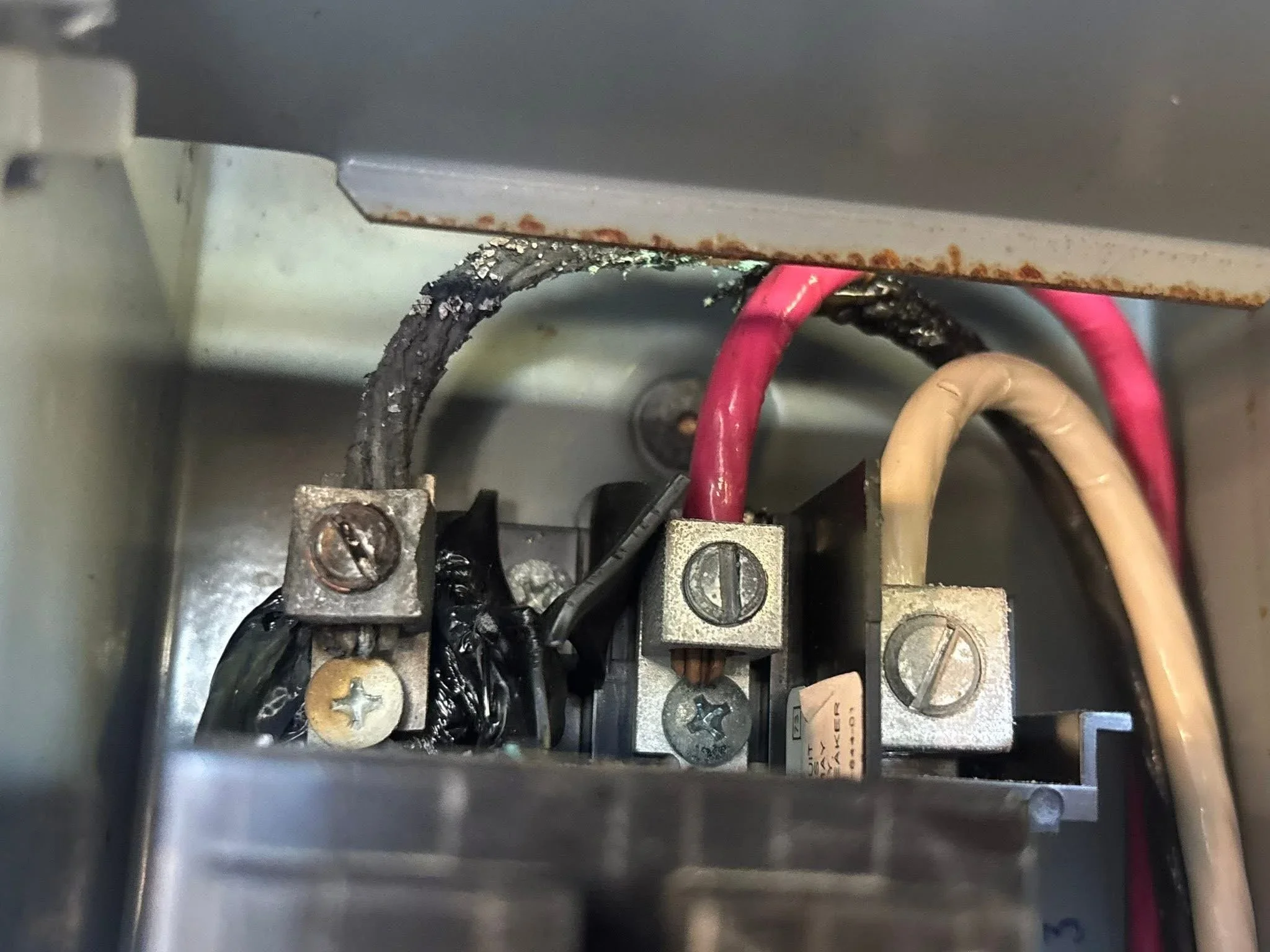 Melted wire from hot tub electrical circuit indicating safety hazard in North Idaho