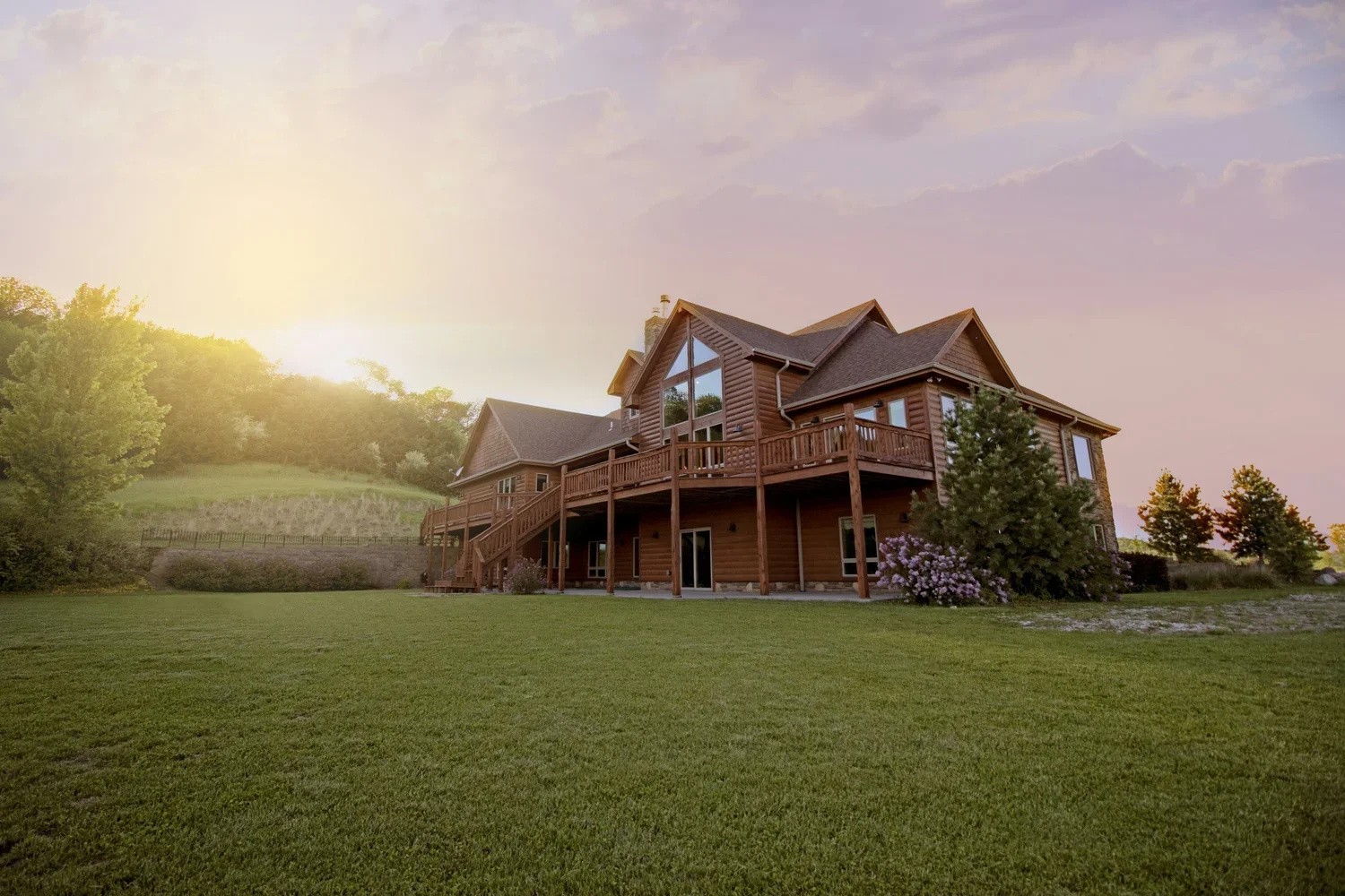 Graphic of a beautiful home at sunset representing residential electrical services in North Idaho