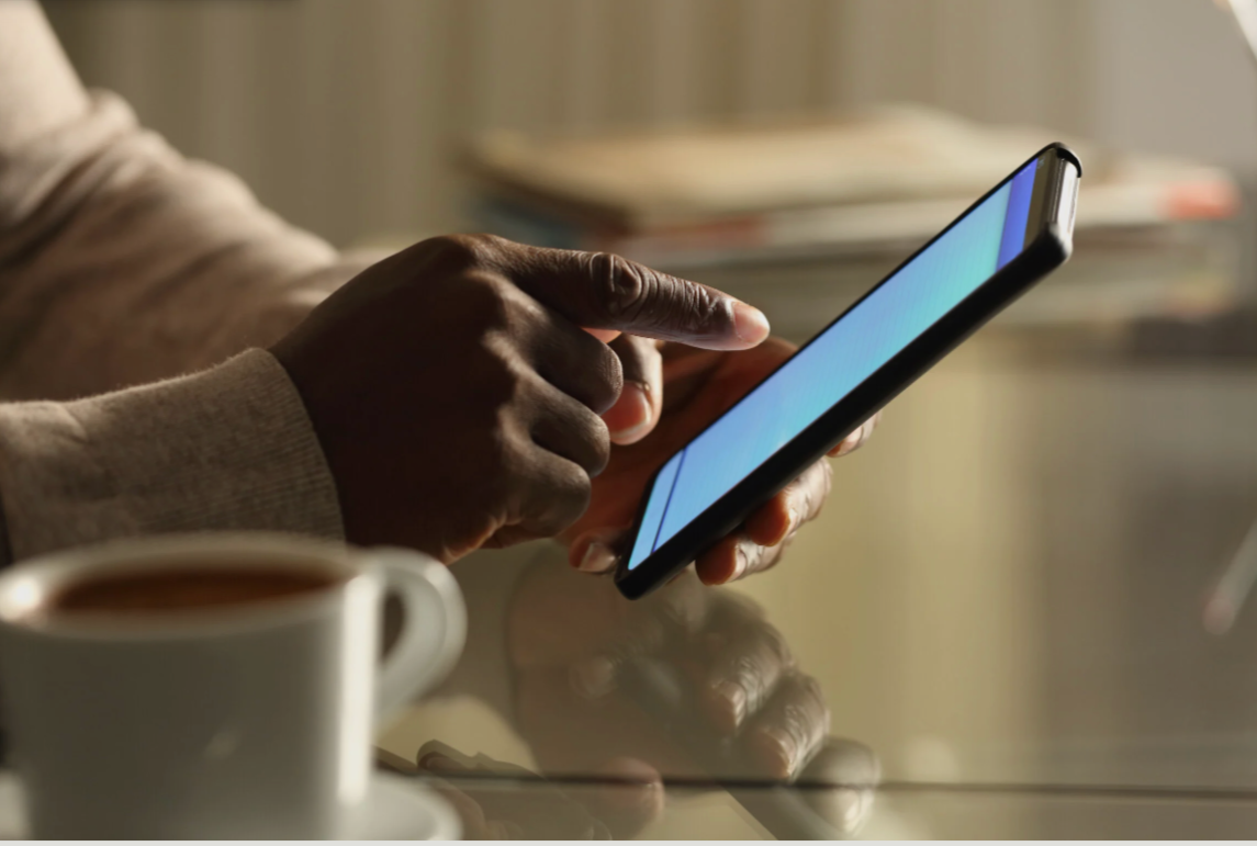 Person accessing secure client portal on phone through SimplePractice