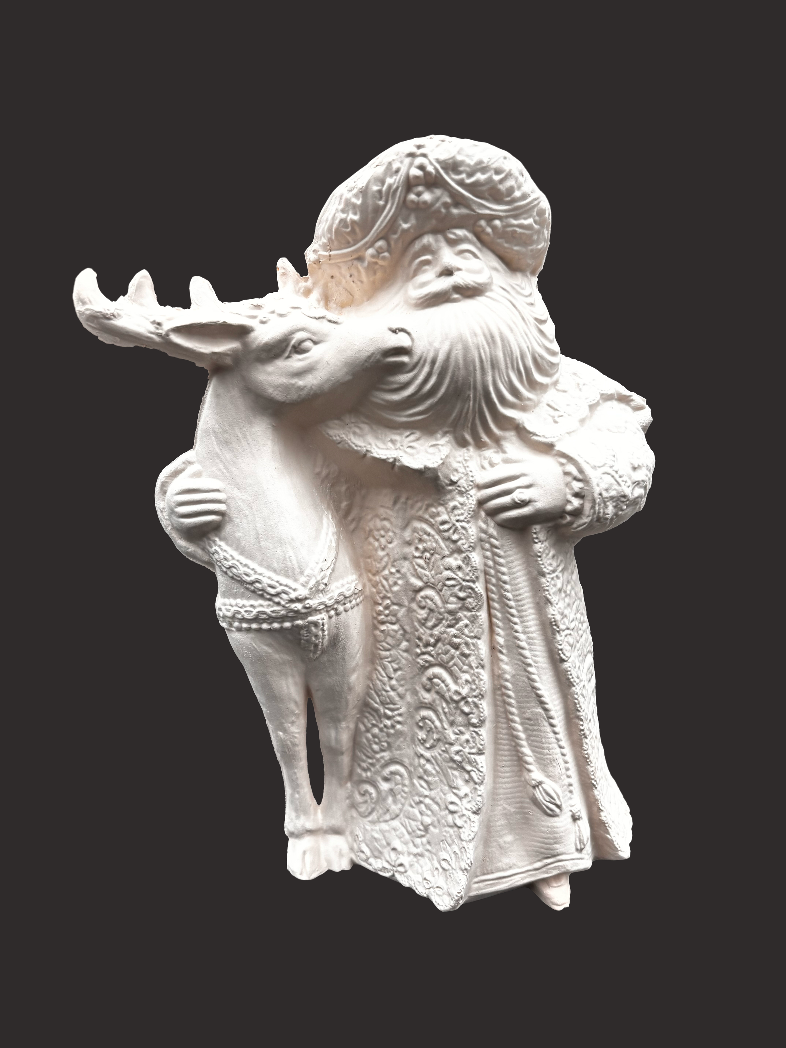 santawithreindeer.png