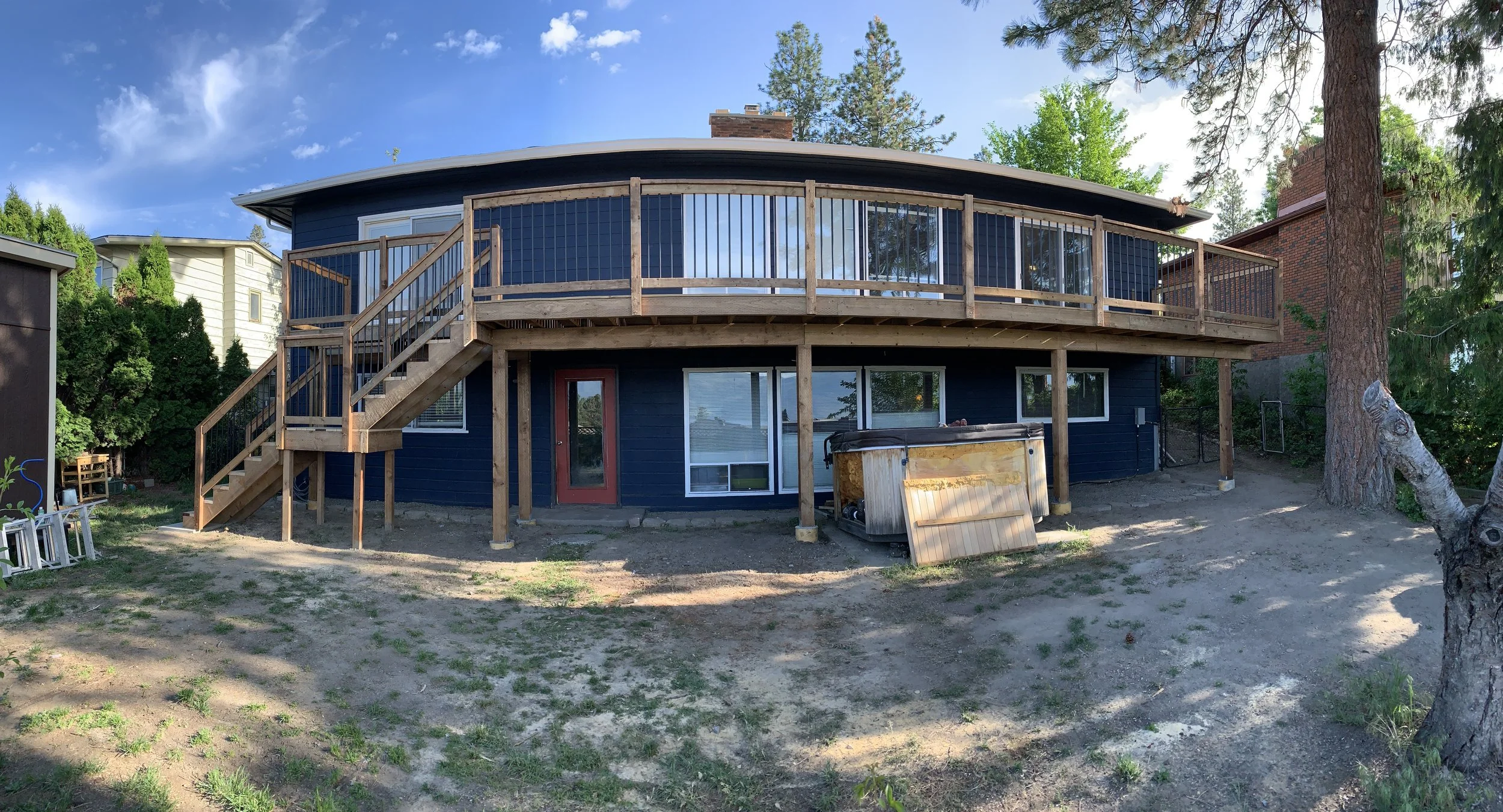 Oranssi technician working on a roof project