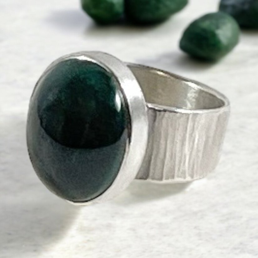 Chrysocolla malachite set in sterling with a textured band.