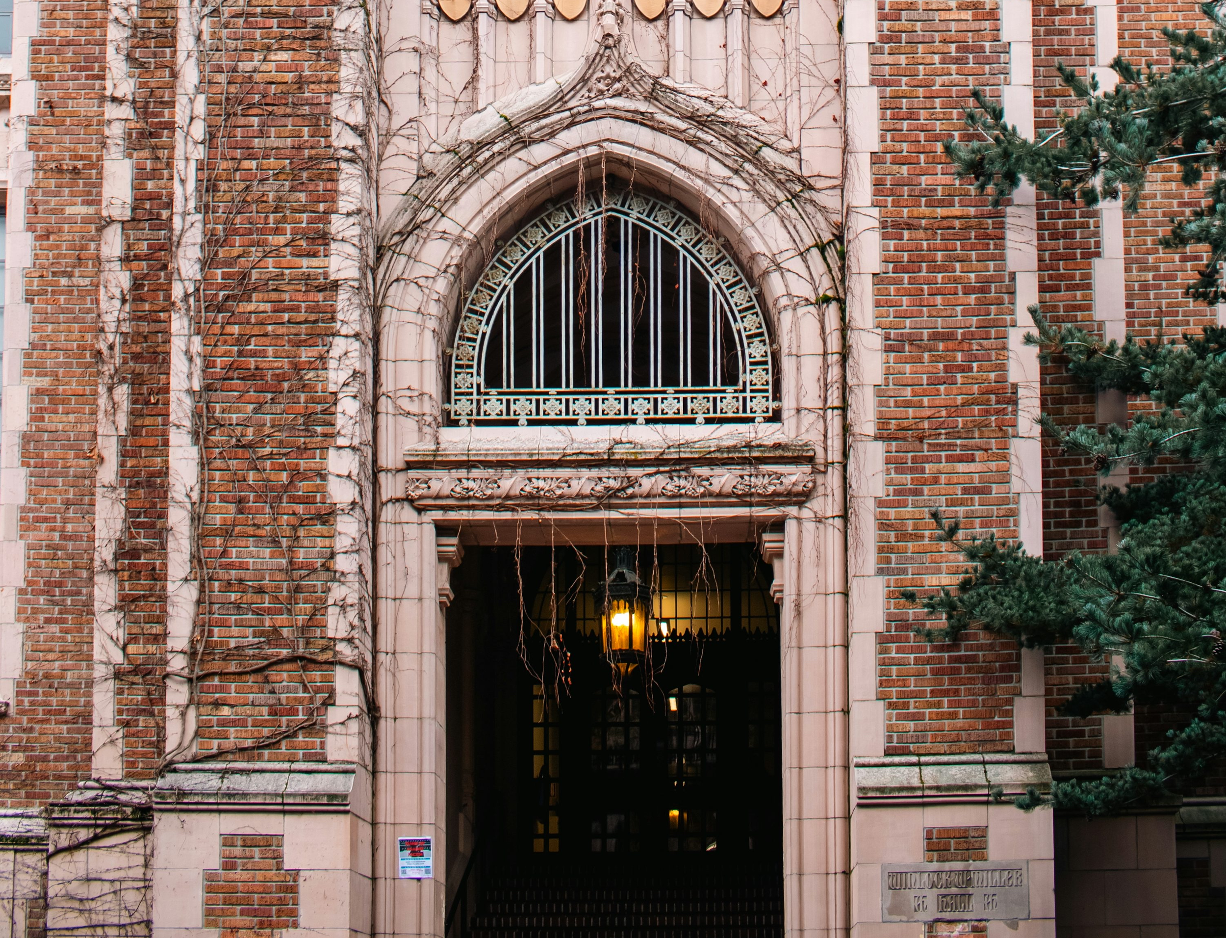 An arched stone entryway — a threshold between where a leader stands today and where they're headed. The vantage point isn't found by moving faster. It's found by stepping through.