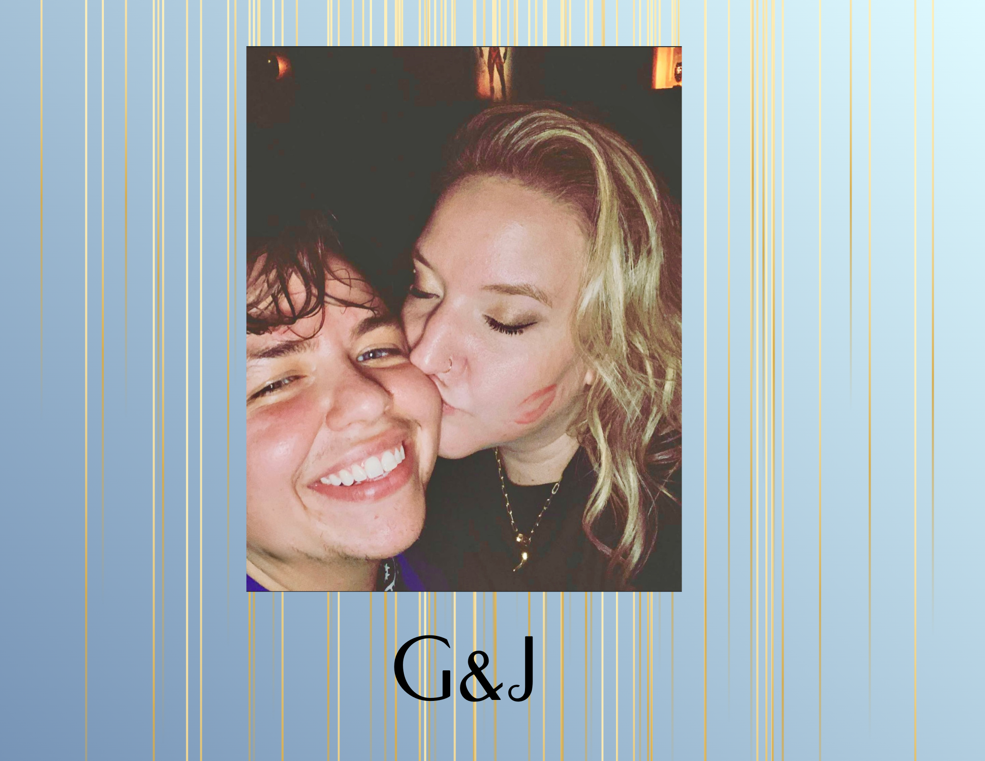 A young man with dark hair and a young woman with blonde hair sharing a kiss on the cheek at a celebration or social gathering, with the woman wearing a necklace and lipstick. The background is dark with some visible lights.