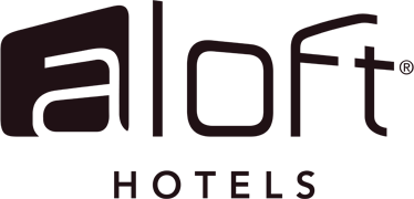 A black logo of 'Aloft Hotels' with the word 'aloft' in lowercase and 'HOTELS' in uppercase beneath it.