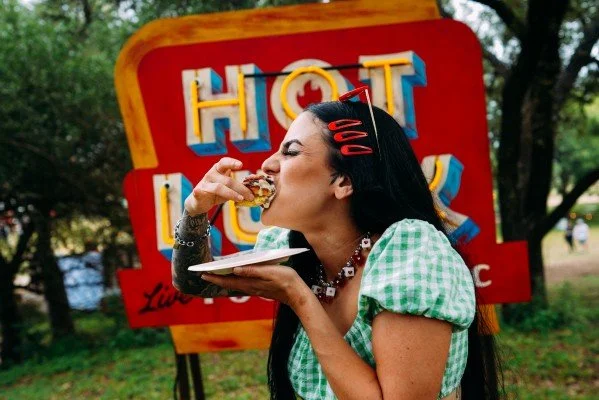 Hot Luck festival guest eating