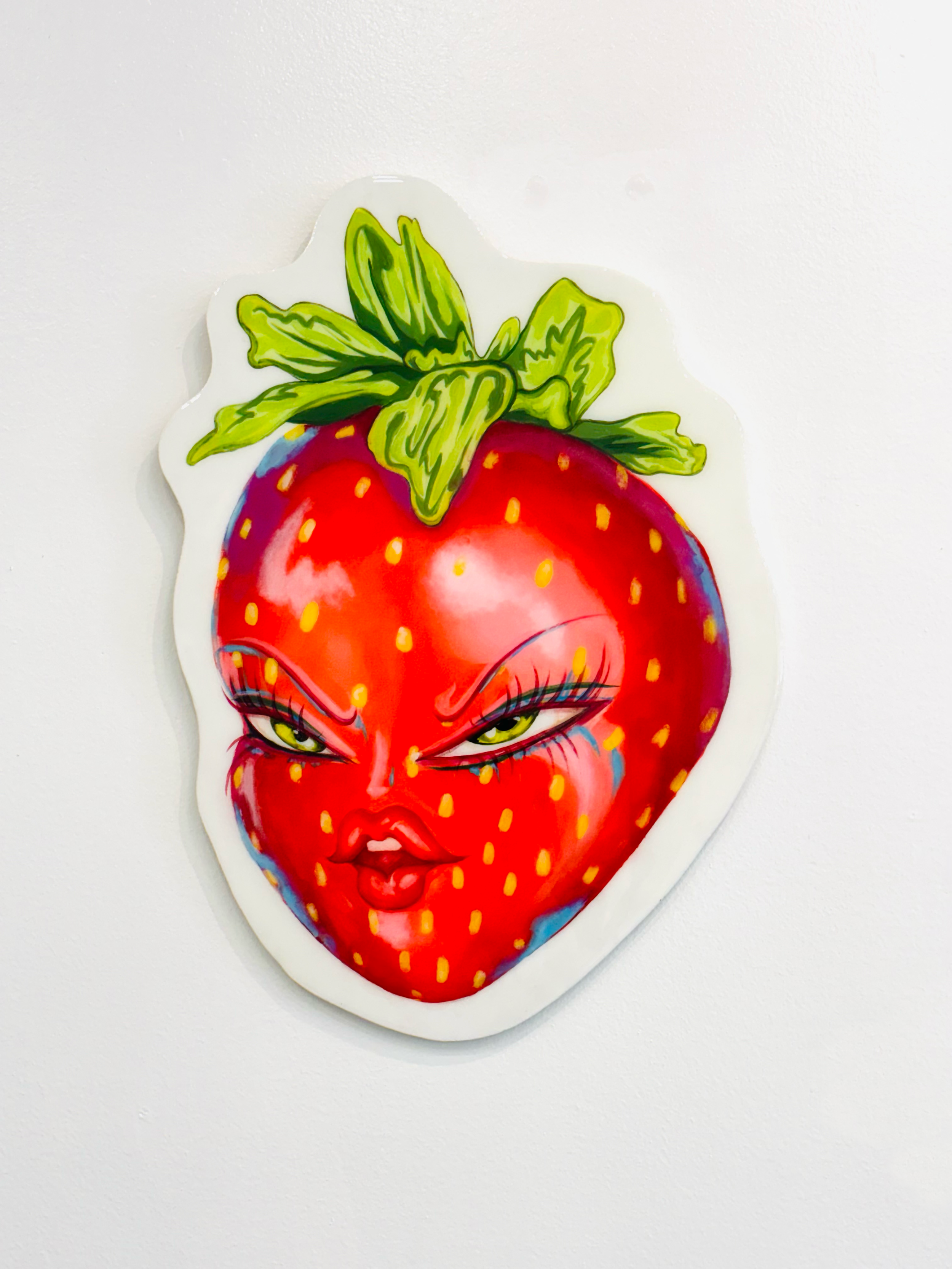 “Sweet but watching.”

Taylor Venturini and Tracey Springford
Disappointed Fruit (Strawberry)
 2026
 painted wood cutout
 dimensions 2’7” x 18”

$800

