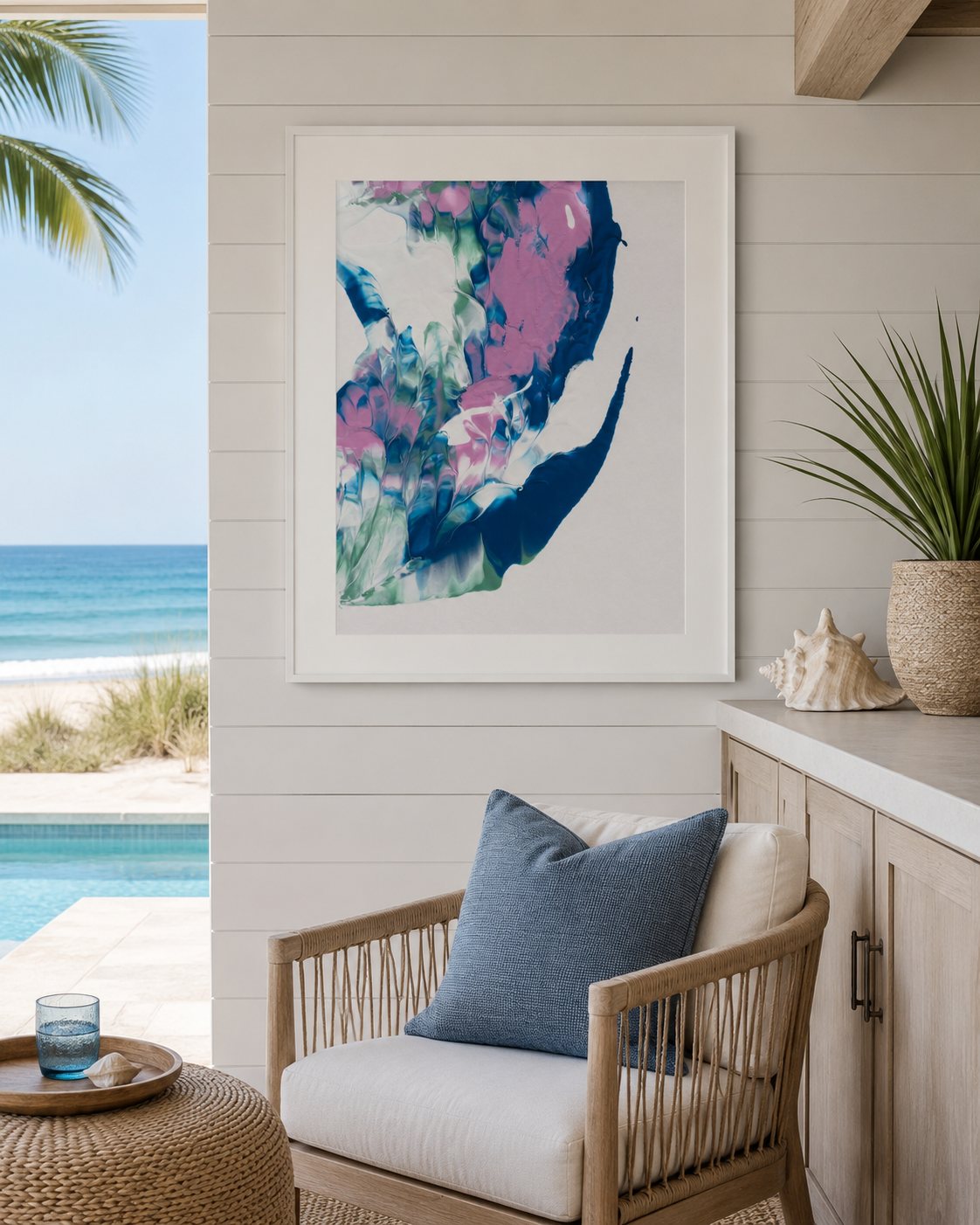 Aquatic Mysteries by Amy Buckner Chowdhry displayed in a bright coastal sitting room overlooking the ocean.